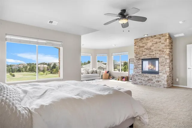 a bed room with a bed and a fireplace