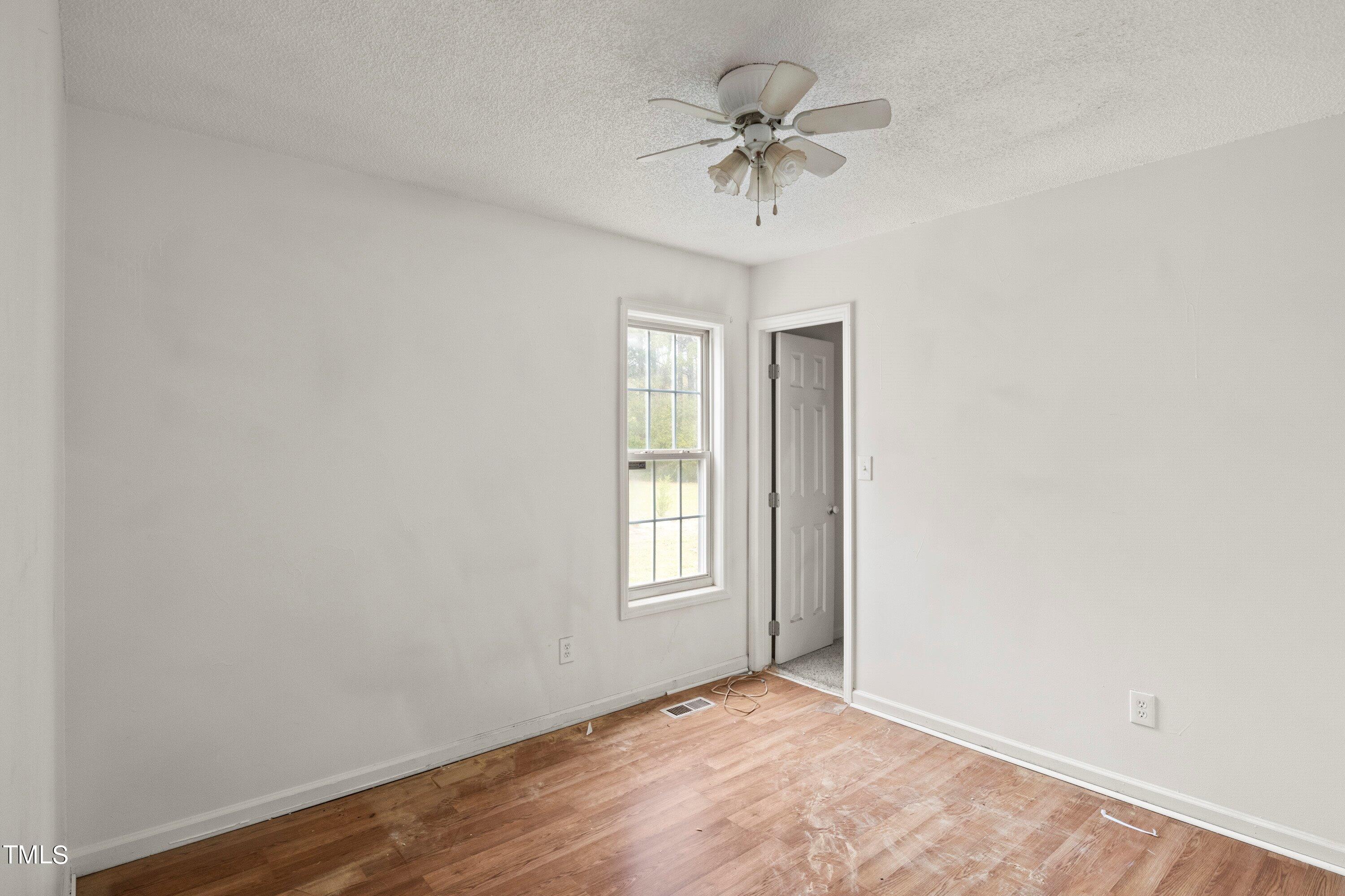 271 Old Fairground Road Willow Spring, NC 27592 - Photo 5 of 11 20-271 Old Fairground Rd20230326_0002