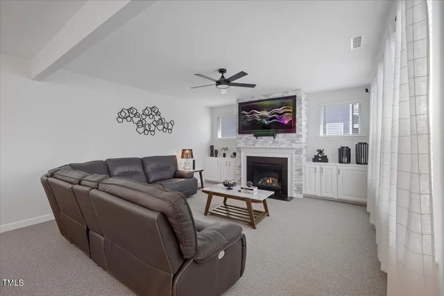 a workspace with furniture and a window