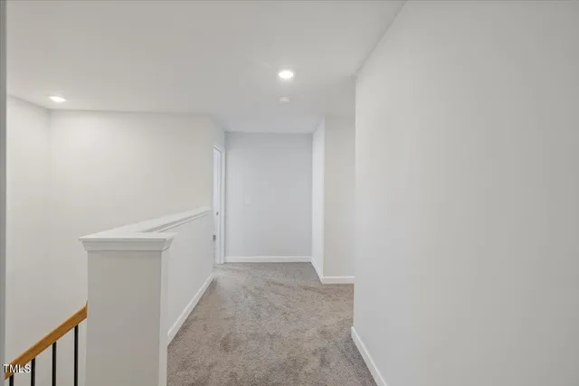 a bathroom with double sink and a mirror