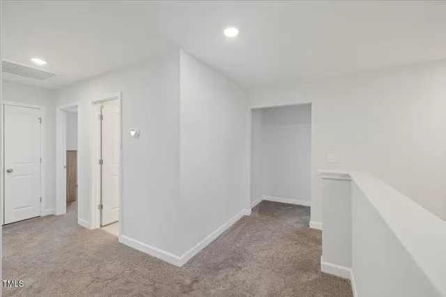 a spacious bathroom with a bathtub sink and toilet