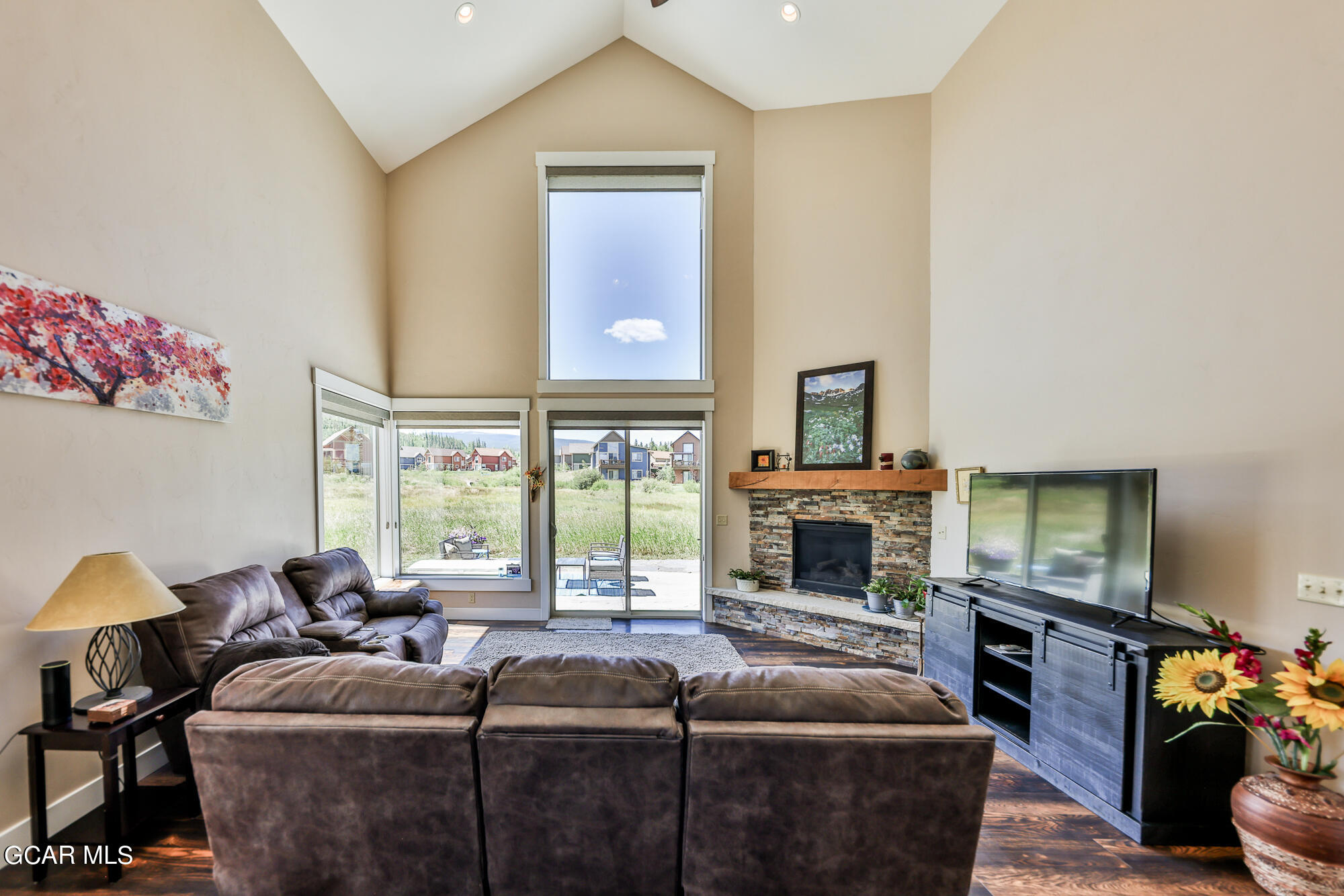 21 Brookside Trail Fraser, CO 80442 - Photo 12 of 62 a living room with fireplace furniture and a flat screen tv