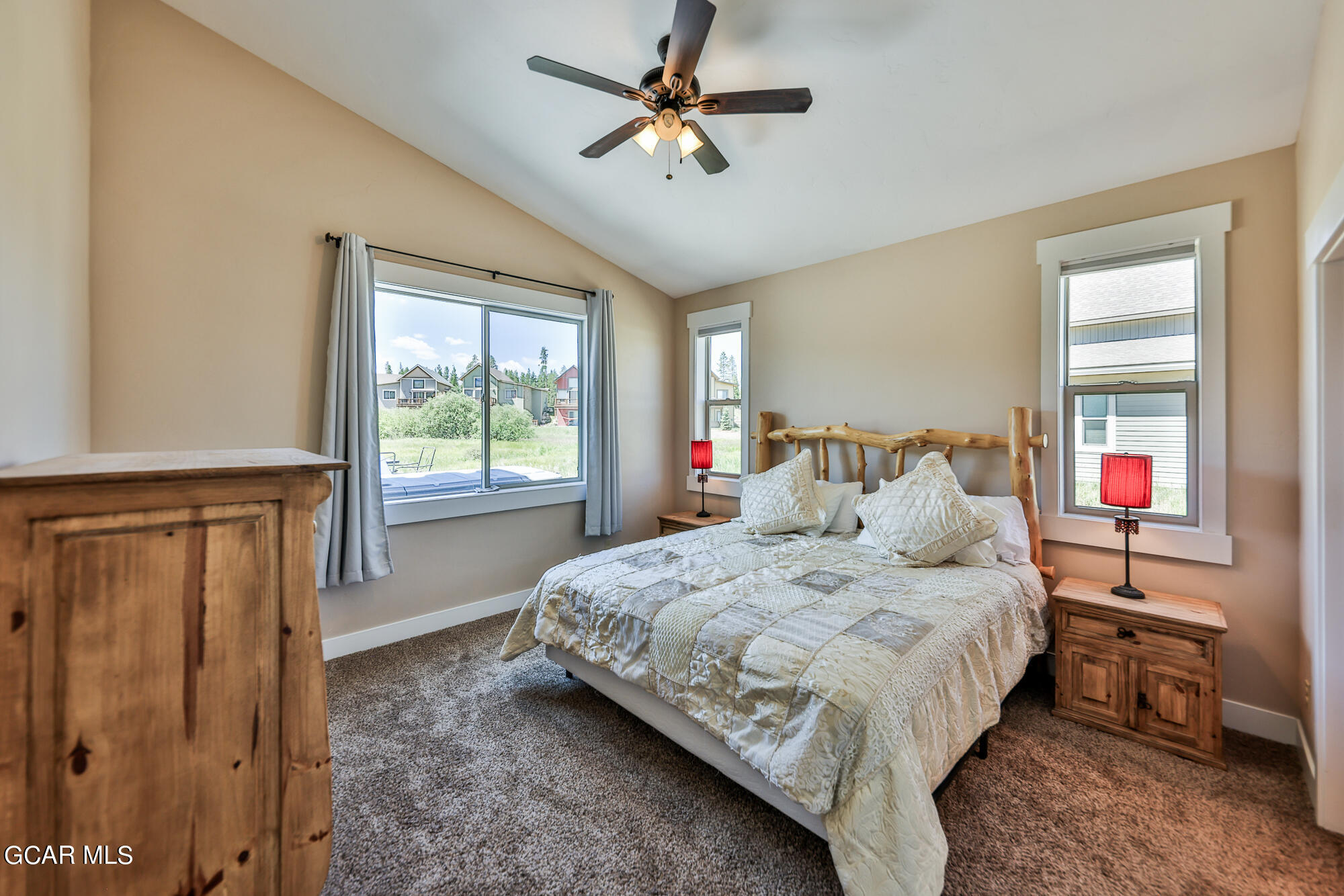 21 Brookside Trail Fraser, CO 80442 - Photo 17 of 62 a bedroom with a bed and a window