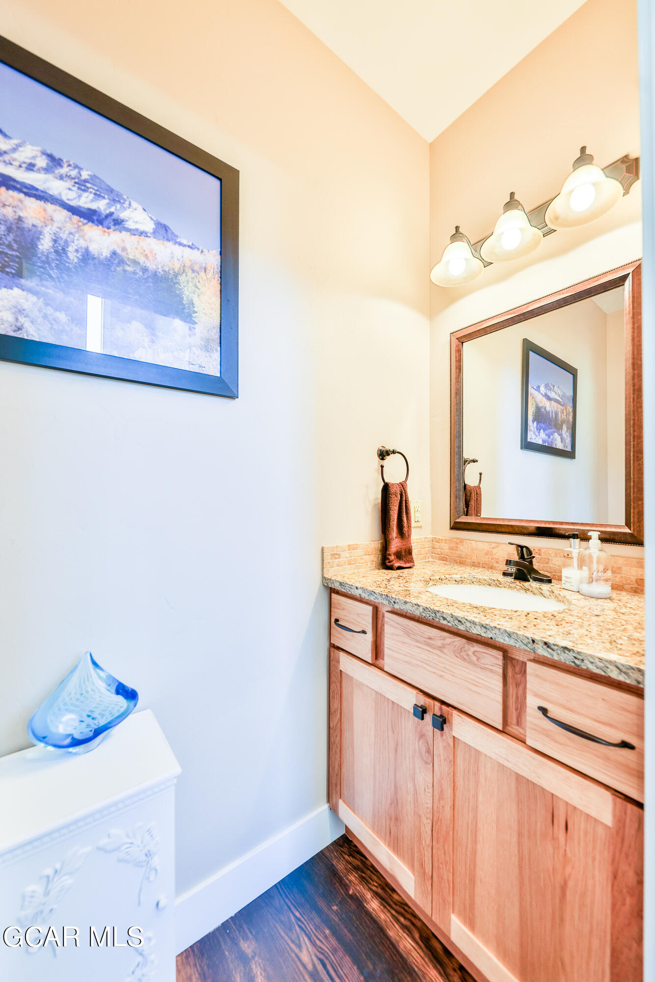 21 Brookside Trail Fraser, CO 80442 - Photo 21 of 62 a bathroom with a sink a mirror and vanity