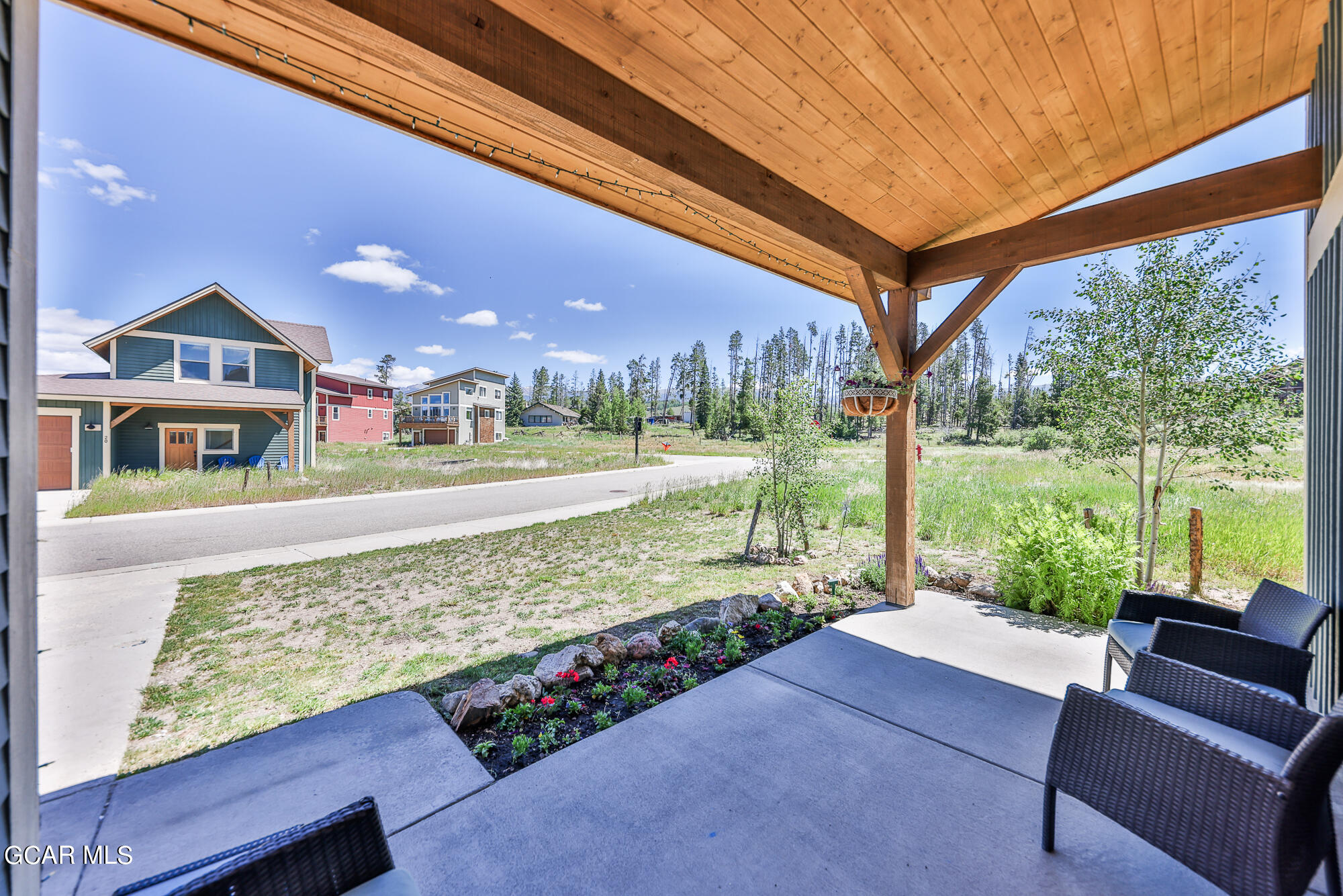 21 Brookside Trail Fraser, CO 80442 - Photo 24 of 62 a front view of a house with a yard