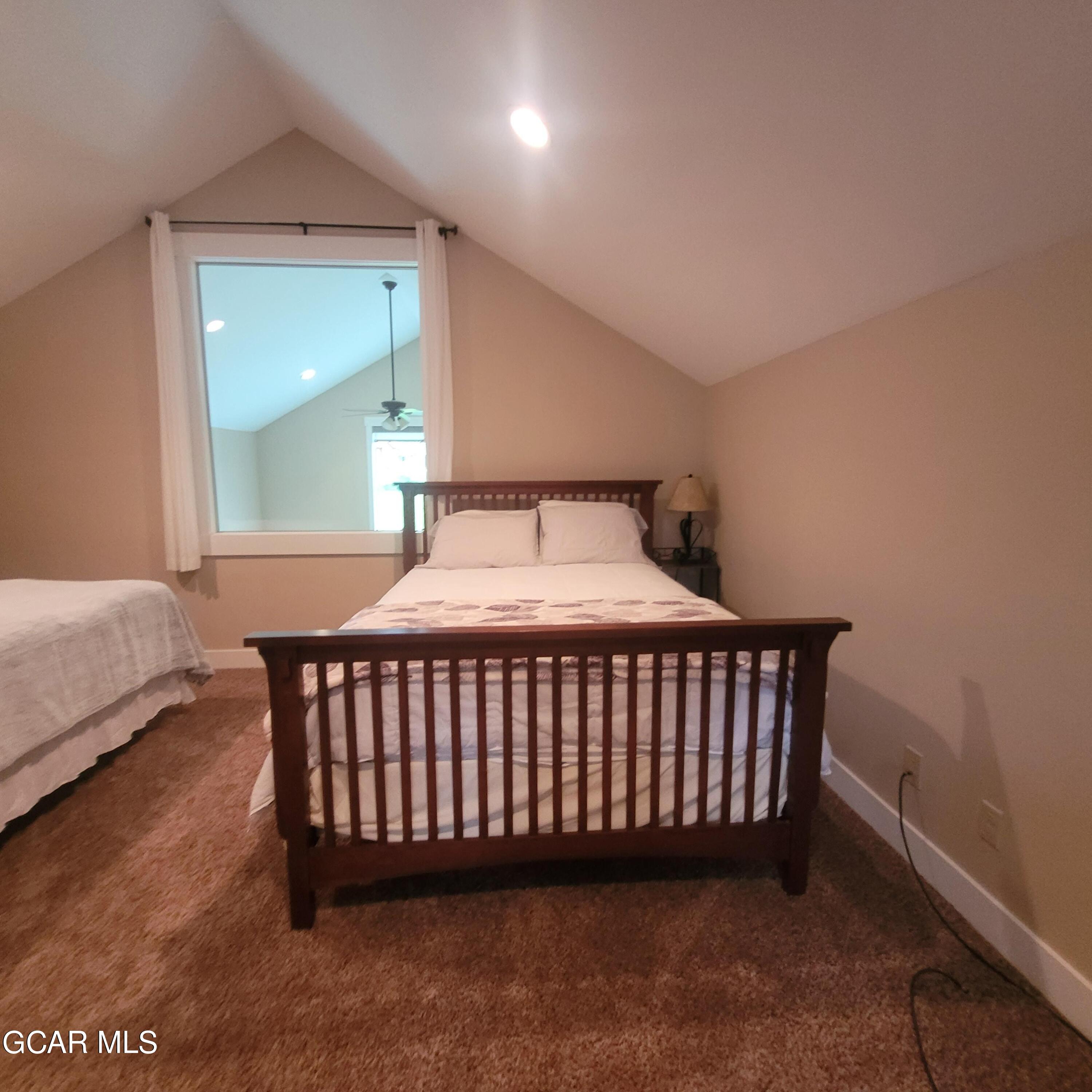 21 Brookside Trail Fraser, CO 80442 - Photo 29 of 62 a bedroom with a bed and window