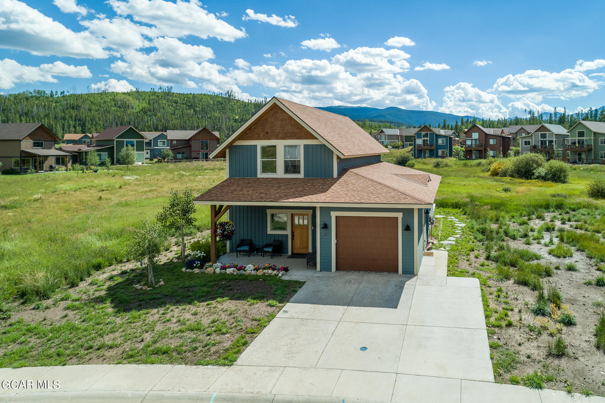 21 Brookside Trail Fraser, CO 80442 - Photo 36 of 62 a front view of house with yard and green space