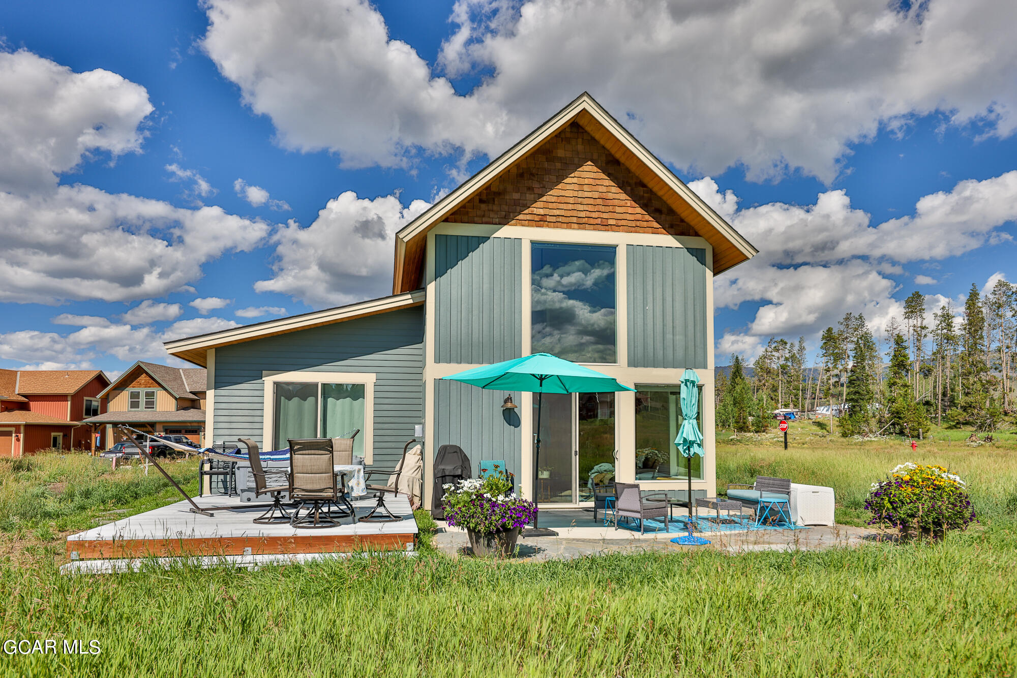 21 Brookside Trail Fraser, CO 80442 - Photo 41 of 62 a front view of a house with swimming pool and porch
