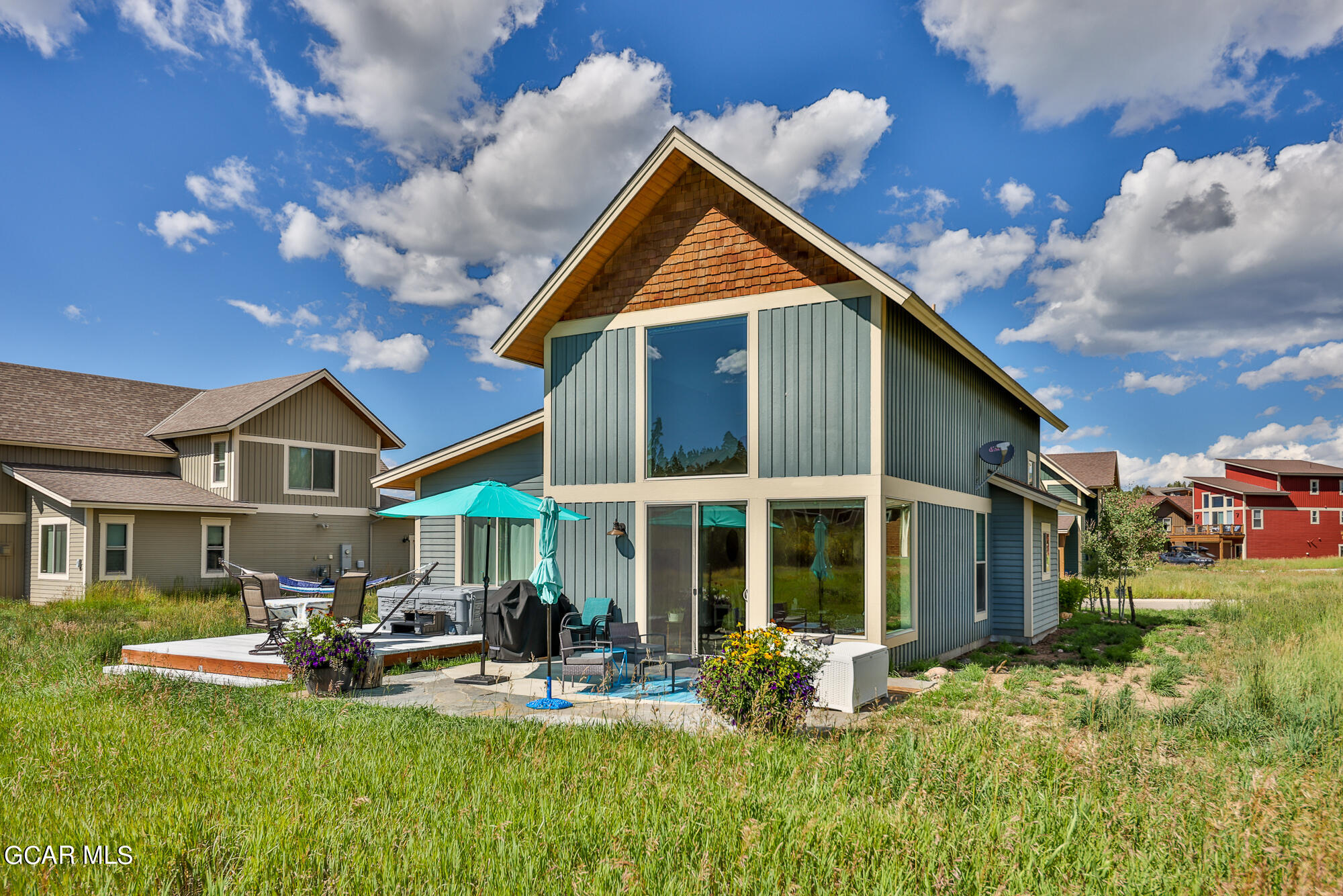 21 Brookside Trail Fraser, CO 80442 - Photo 43 of 62 a view of a house with backyard porch and sitting area