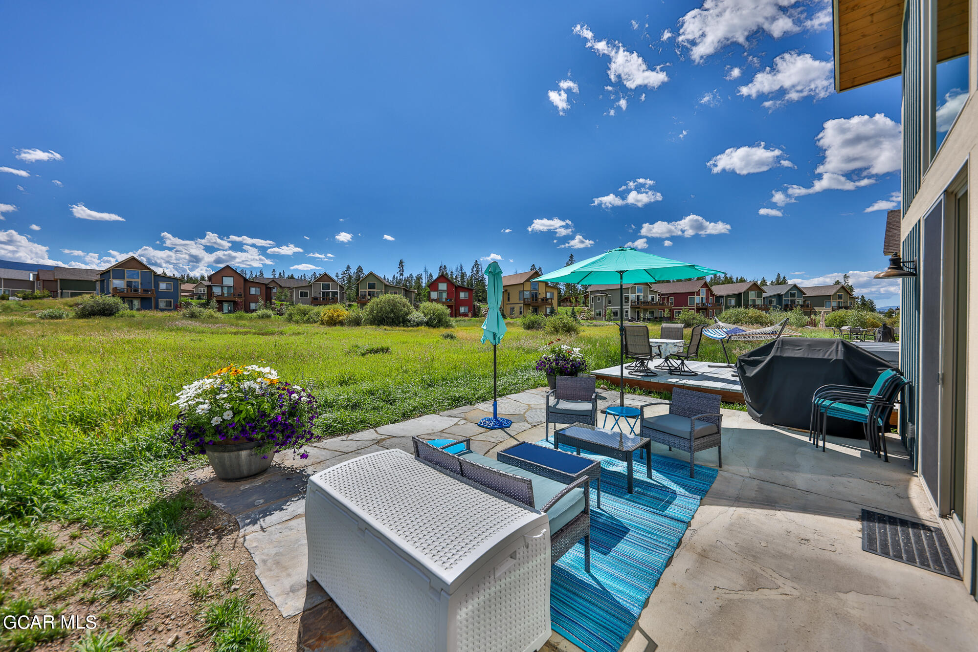 21 Brookside Trail Fraser, CO 80442 - Photo 44 of 62 a view of a patio with couches and table