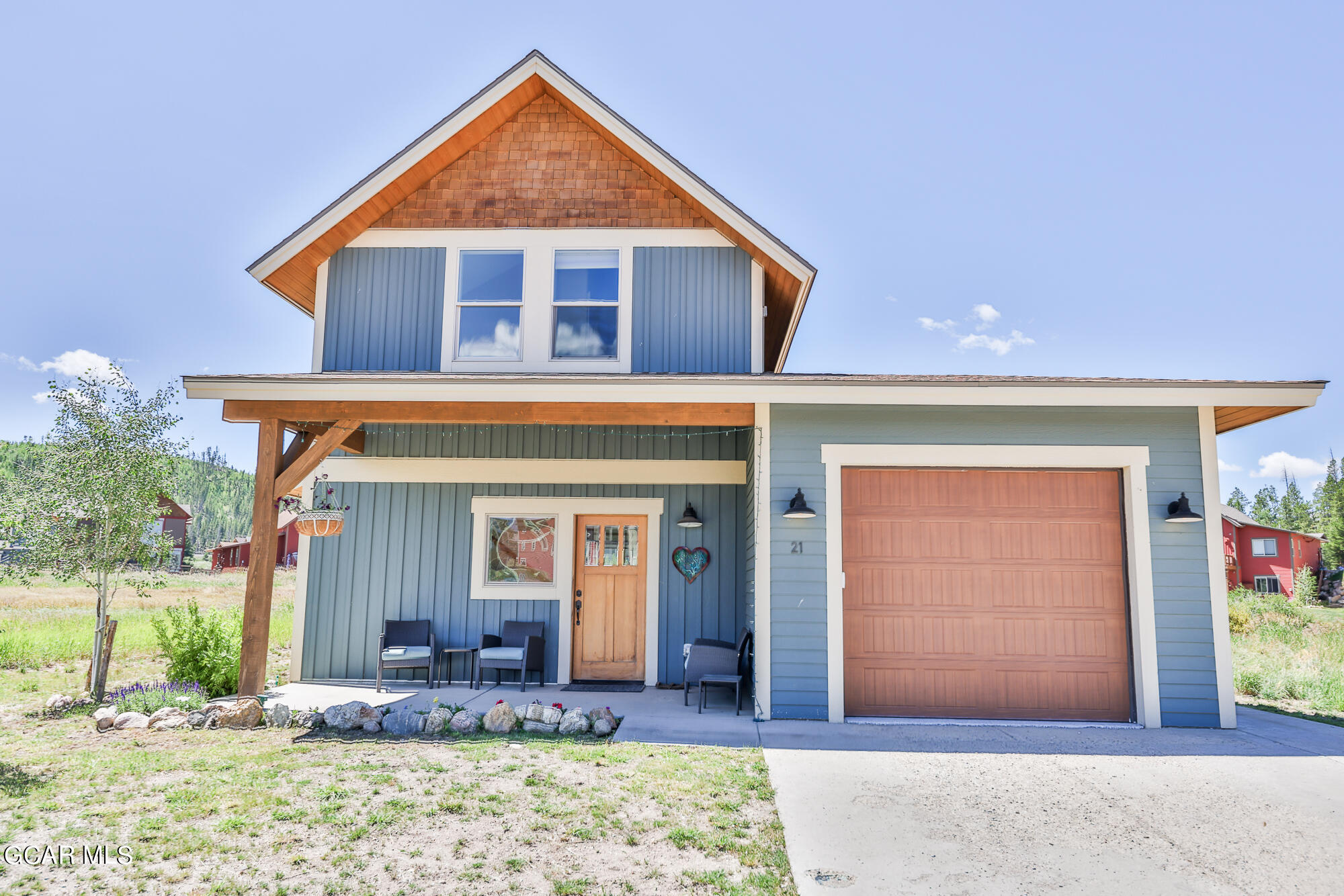 21 Brookside Trail Fraser, CO 80442 - Photo 52 of 62 a front view of a house with garden