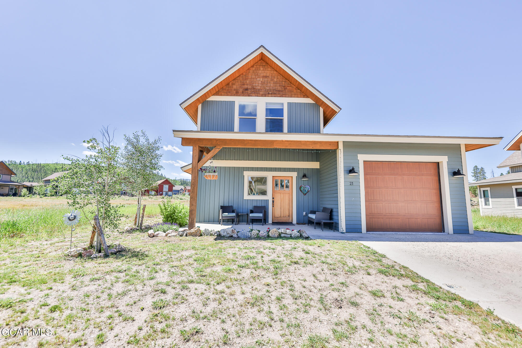 21 Brookside Trail Fraser, CO 80442 - Photo 53 of 62 a front view of a house with a yard