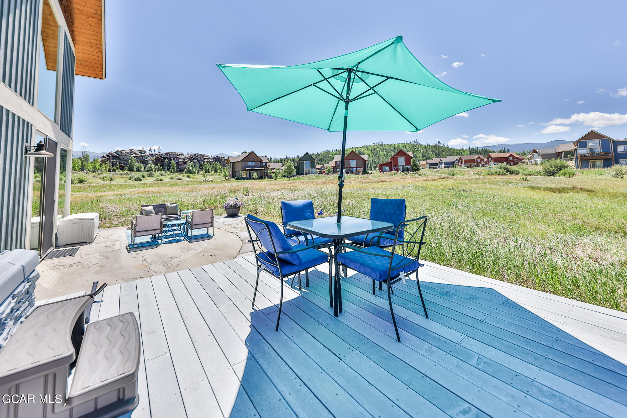 21 Brookside Trail Fraser, CO 80442 - Photo 56 of 62 a view of a lake with table and chairs