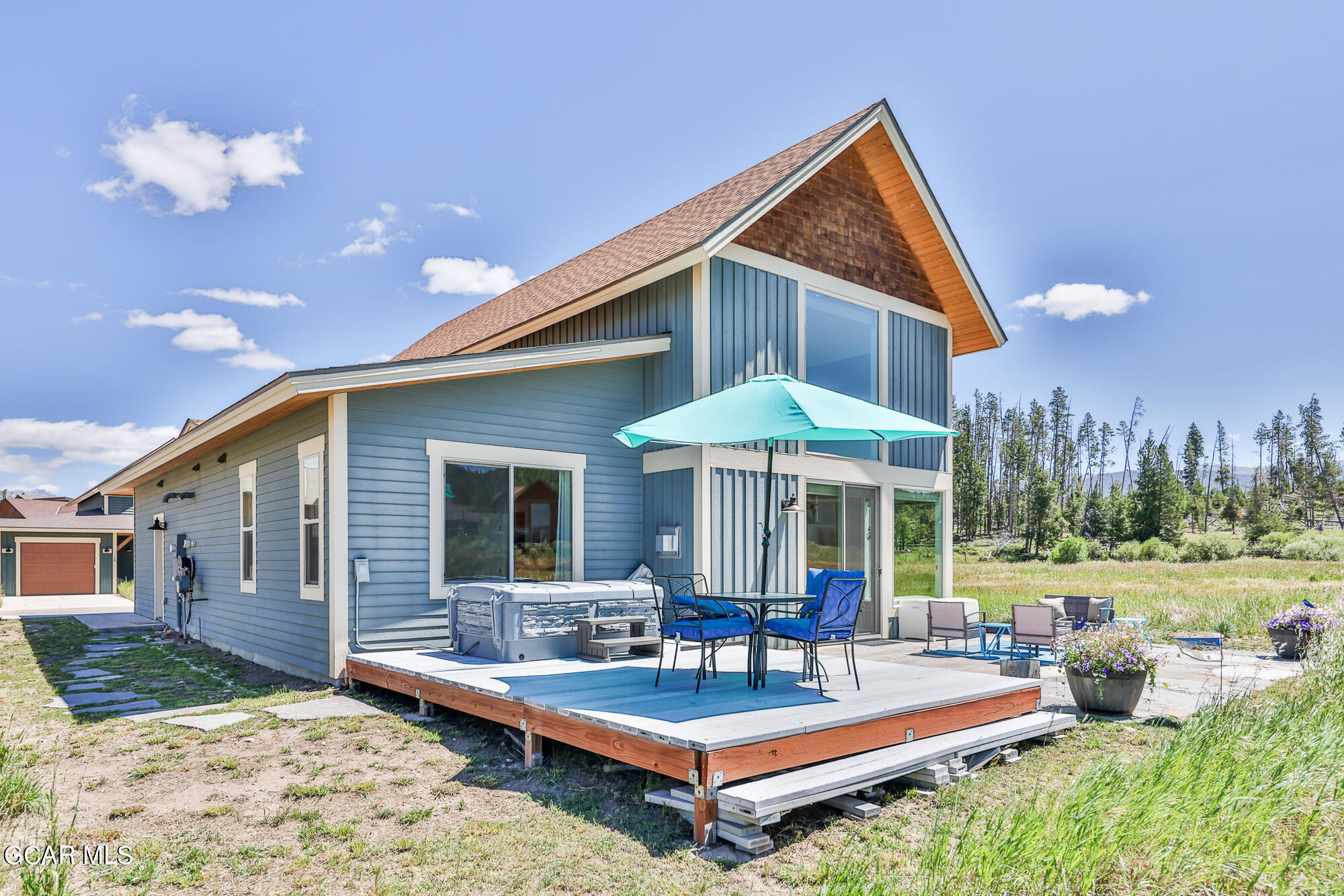 21 Brookside Trail Fraser, CO 80442 - Photo 57 of 62 a view of house with backyard and outdoor seating
