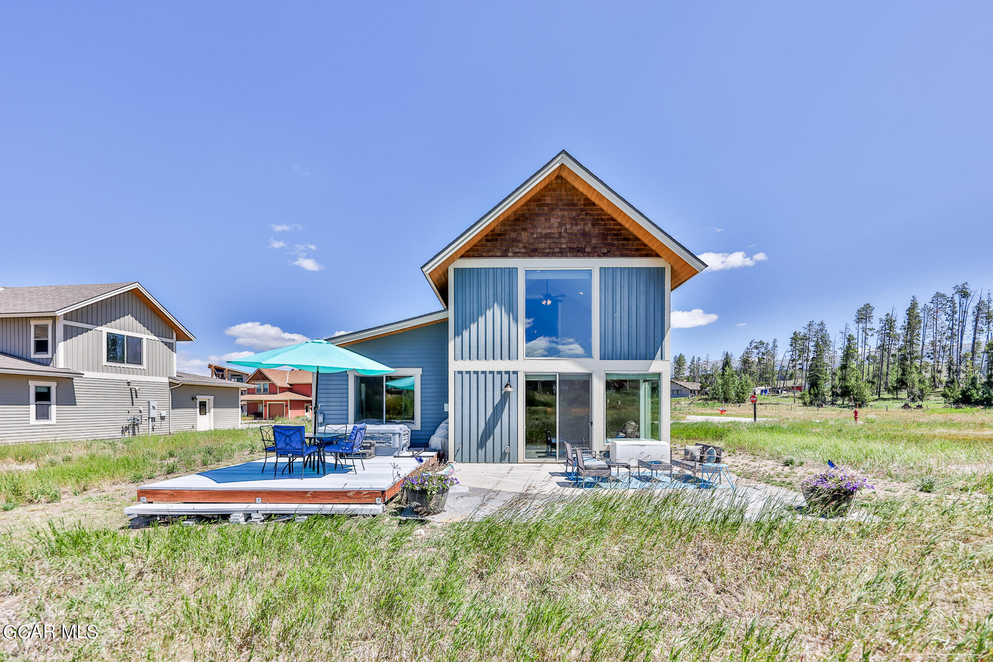 21 Brookside Trail Fraser, CO 80442 - Photo 58 of 62 a front view of a house with swimming pool having outdoor seating