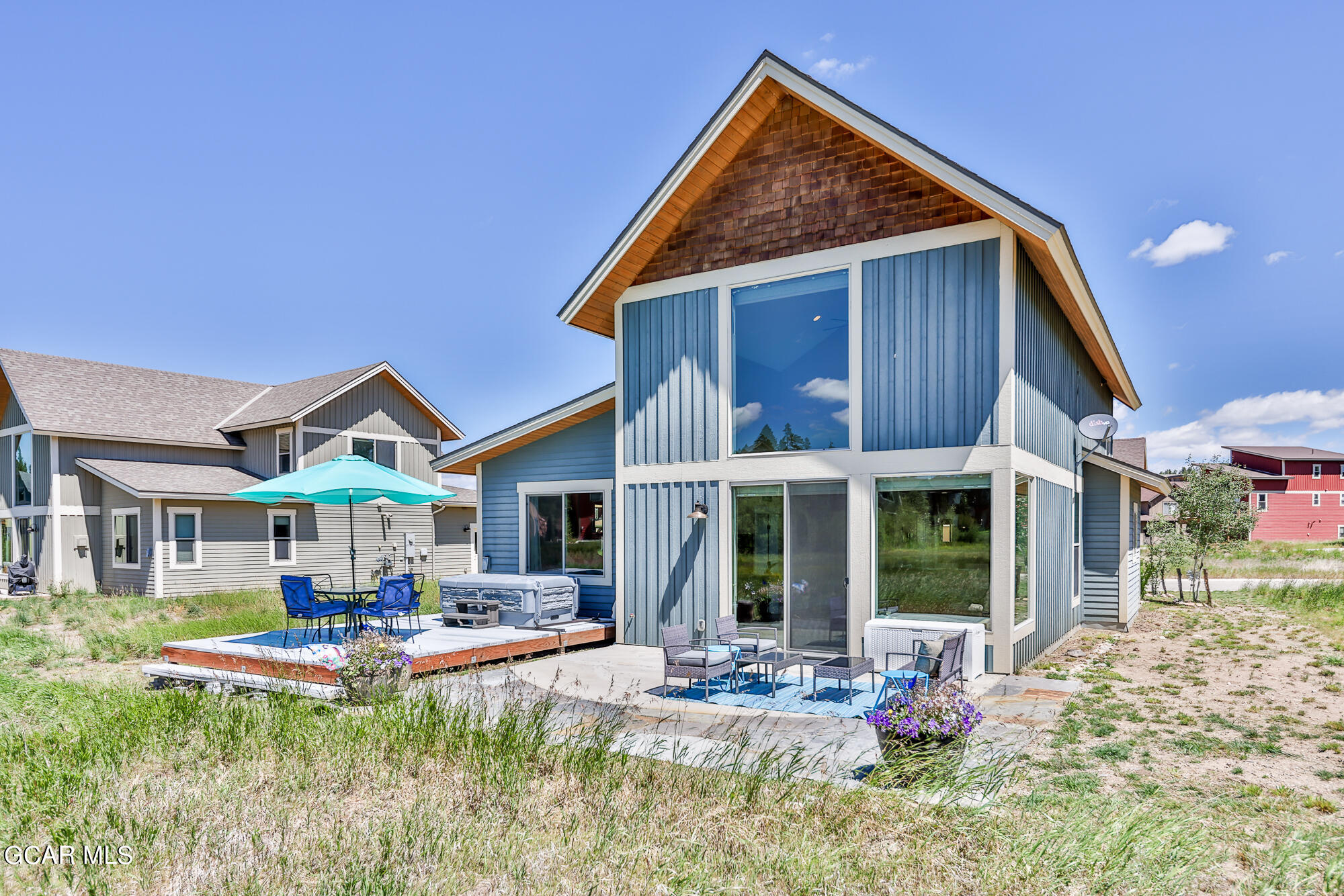 21 Brookside Trail Fraser, CO 80442 - Photo 59 of 62 a front view of a house with swimming pool and porch