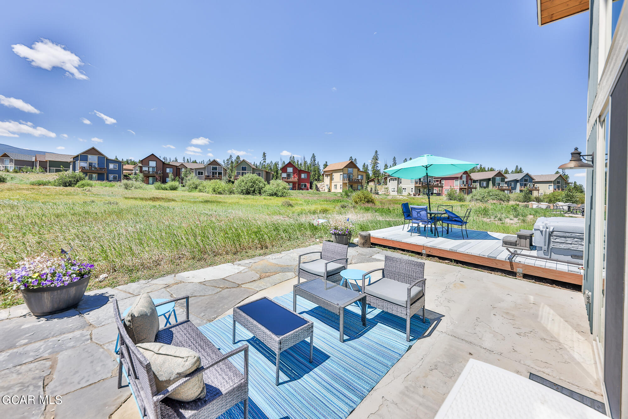 21 Brookside Trail Fraser, CO 80442 - Photo 61 of 62 a patio with table and chairs