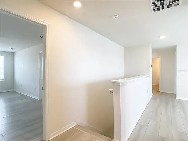 a bathroom with a bathtub and a toilet