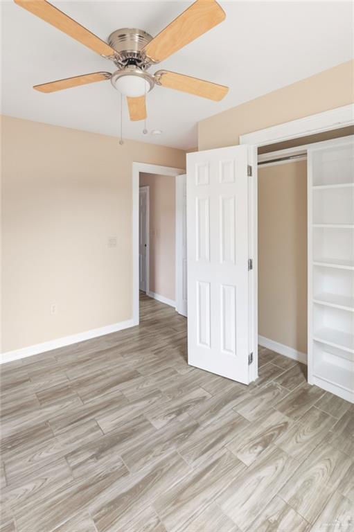 811 Carlson Street Elsa, TX 78538 - Photo 7 of 10 wooden floor in an empty room