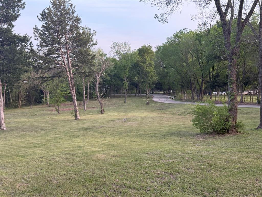 Tbd Waterworks Road Midlothian, TX 76065 - Photo 23 of 23 a backyard of a house with lots of green space