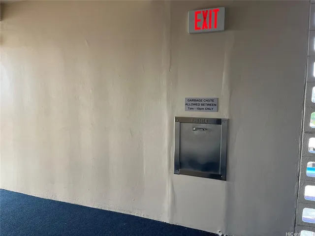 a view of a hallway with washer and dryer