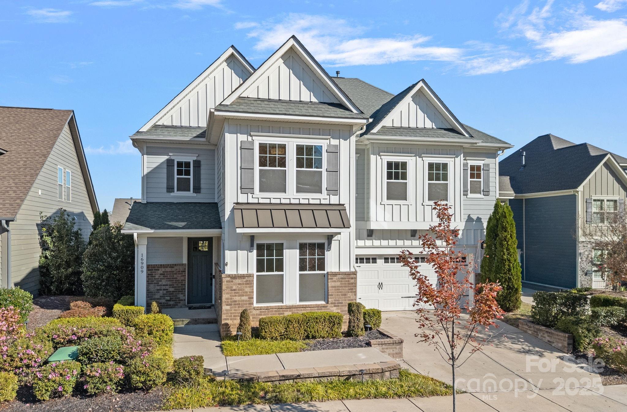 16909 Setter Point Lane Davidson, NC 28036 - Photo 1 of 45 a front view of a house with a yard