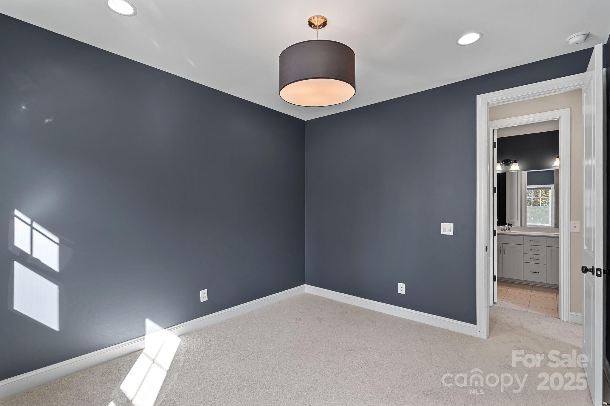 16909 Setter Point Lane Davidson, NC 28036 - Photo 29 of 45 a view of an empty room and window