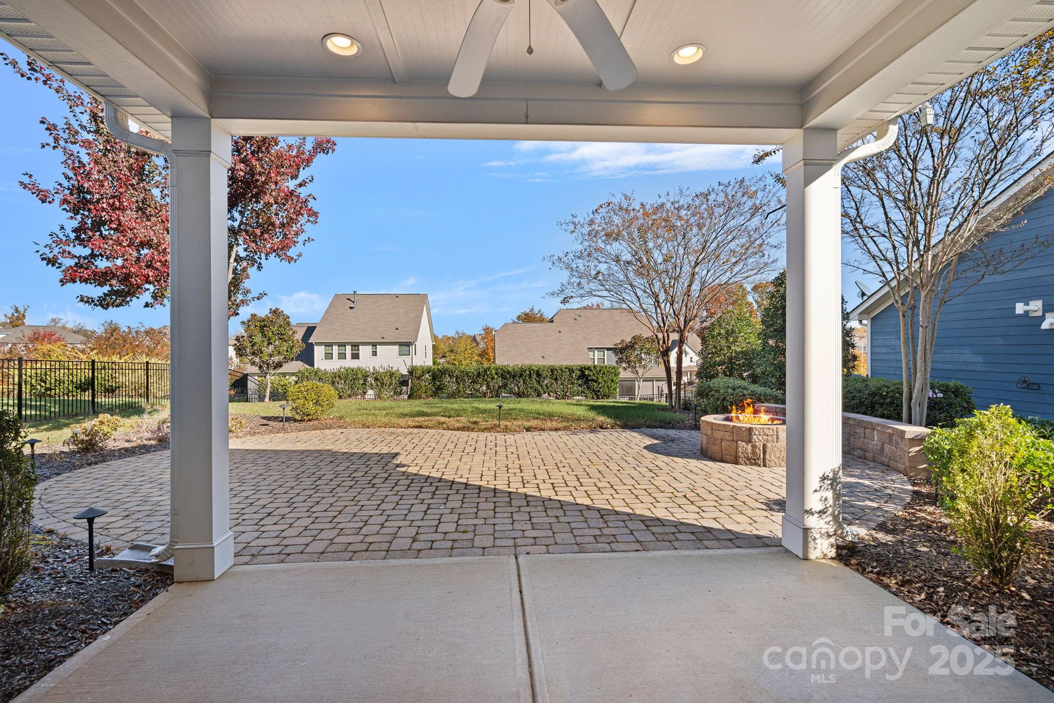 16909 Setter Point Lane Davidson, NC 28036 - Photo 33 of 45 a view of a street with a tree in front of it