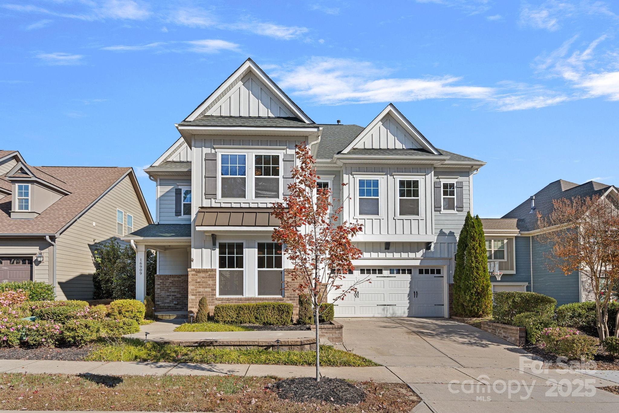 16909 Setter Point Lane Davidson, NC 28036 - Photo 39 of 45 front view of a house with a yard