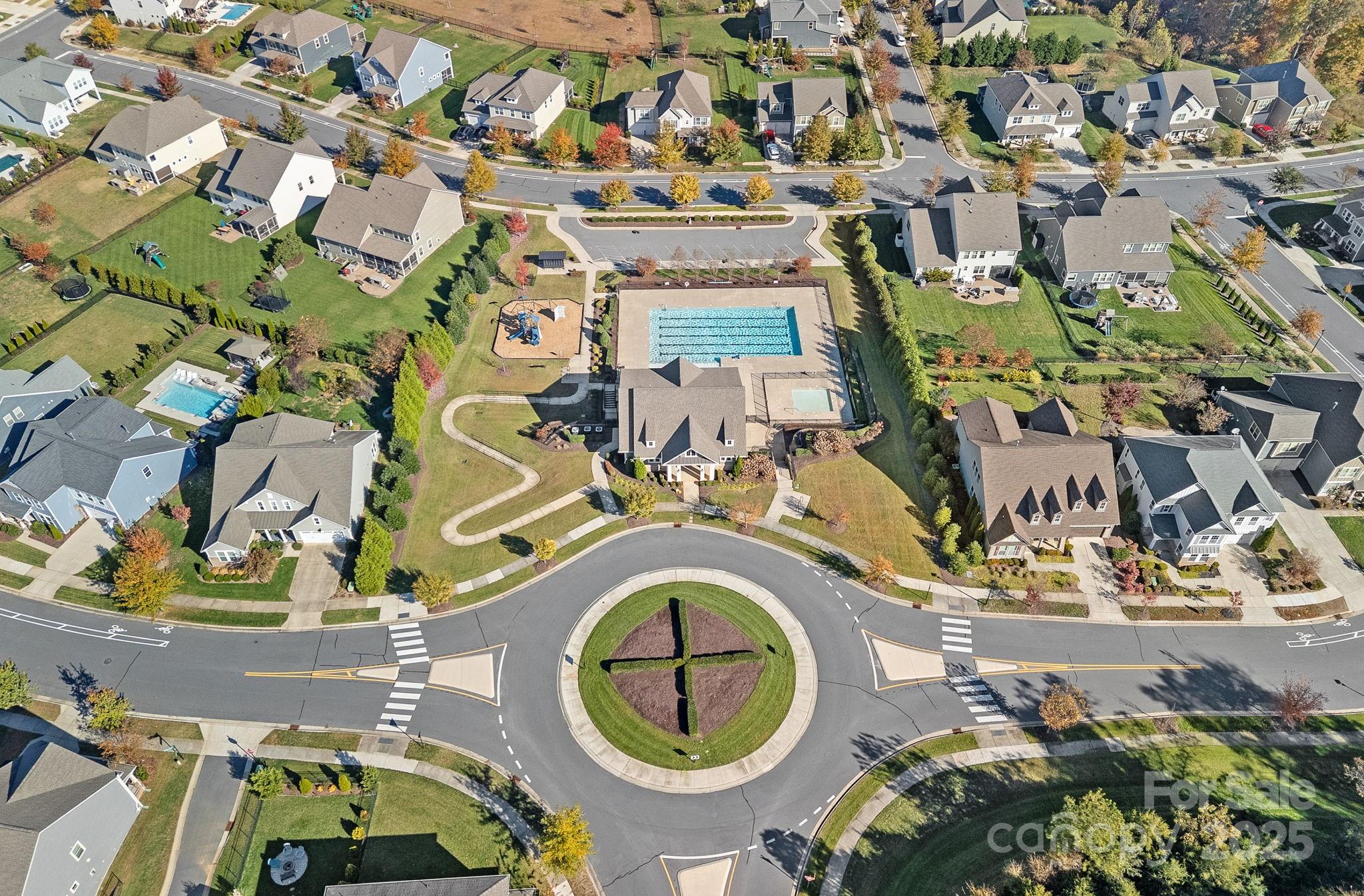 16909 Setter Point Lane Davidson, NC 28036 - Photo 44 of 45 an aerial view of a house with a swimming pool and outdoor space