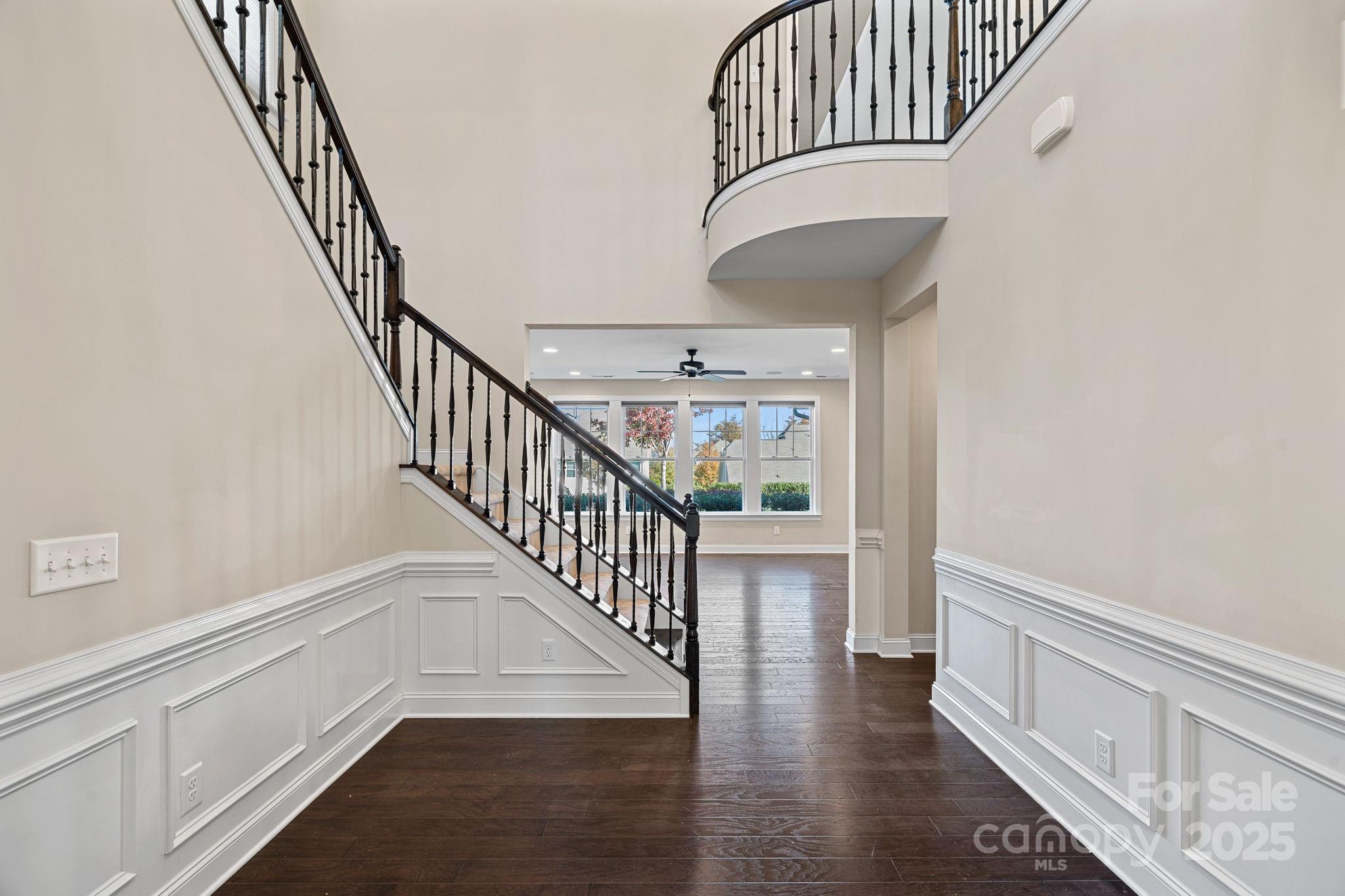 16909 Setter Point Lane Davidson, NC 28036 - Photo 7 of 45 a view of staircase with railing and white walls