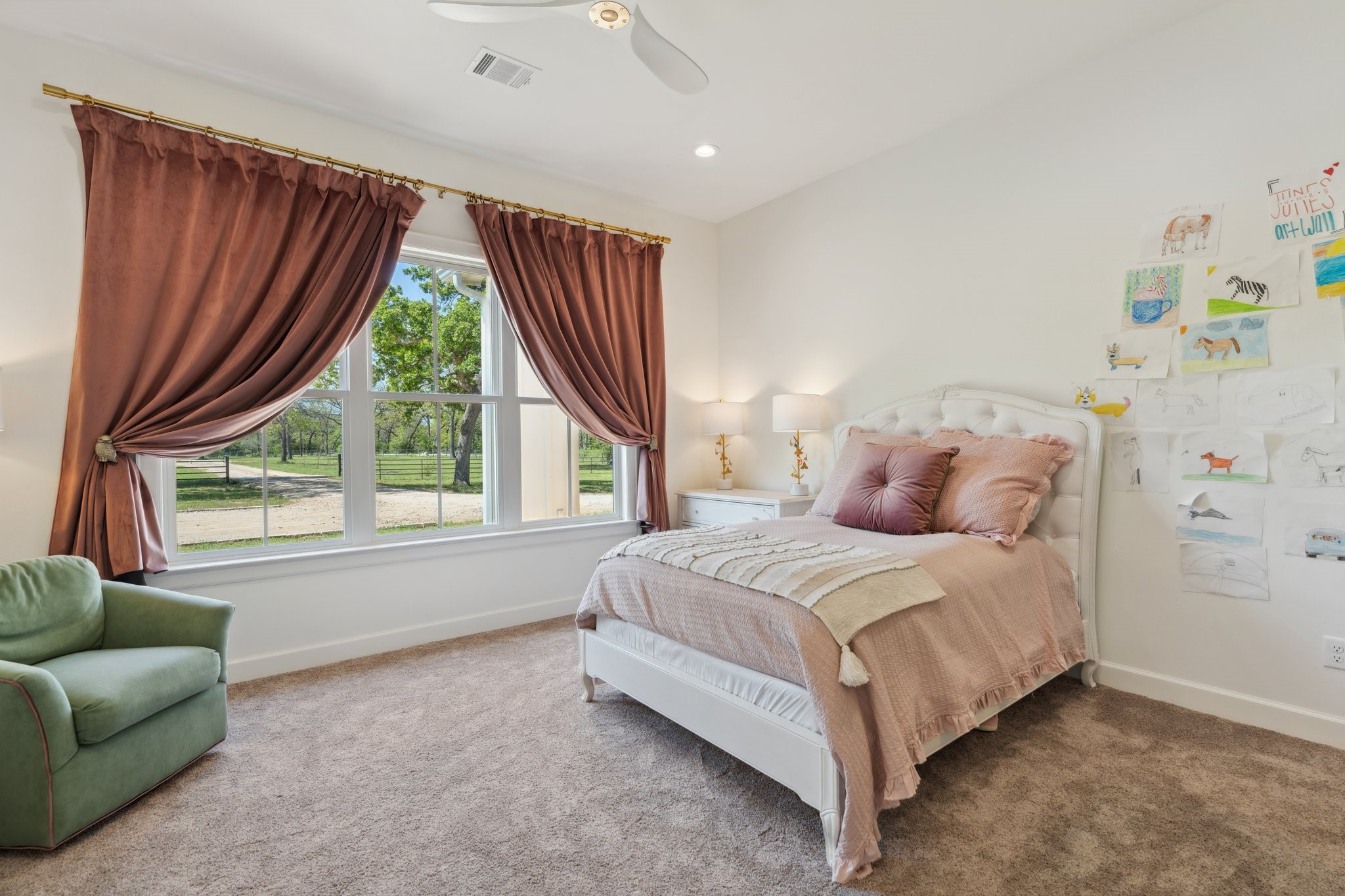 4052 Kuykendall Road Bellville, TX 77418 - Photo 18 of 40 This charming secondary bedroom features built-ins, an en-suite bathroom, and offers lovely views of the front yard.