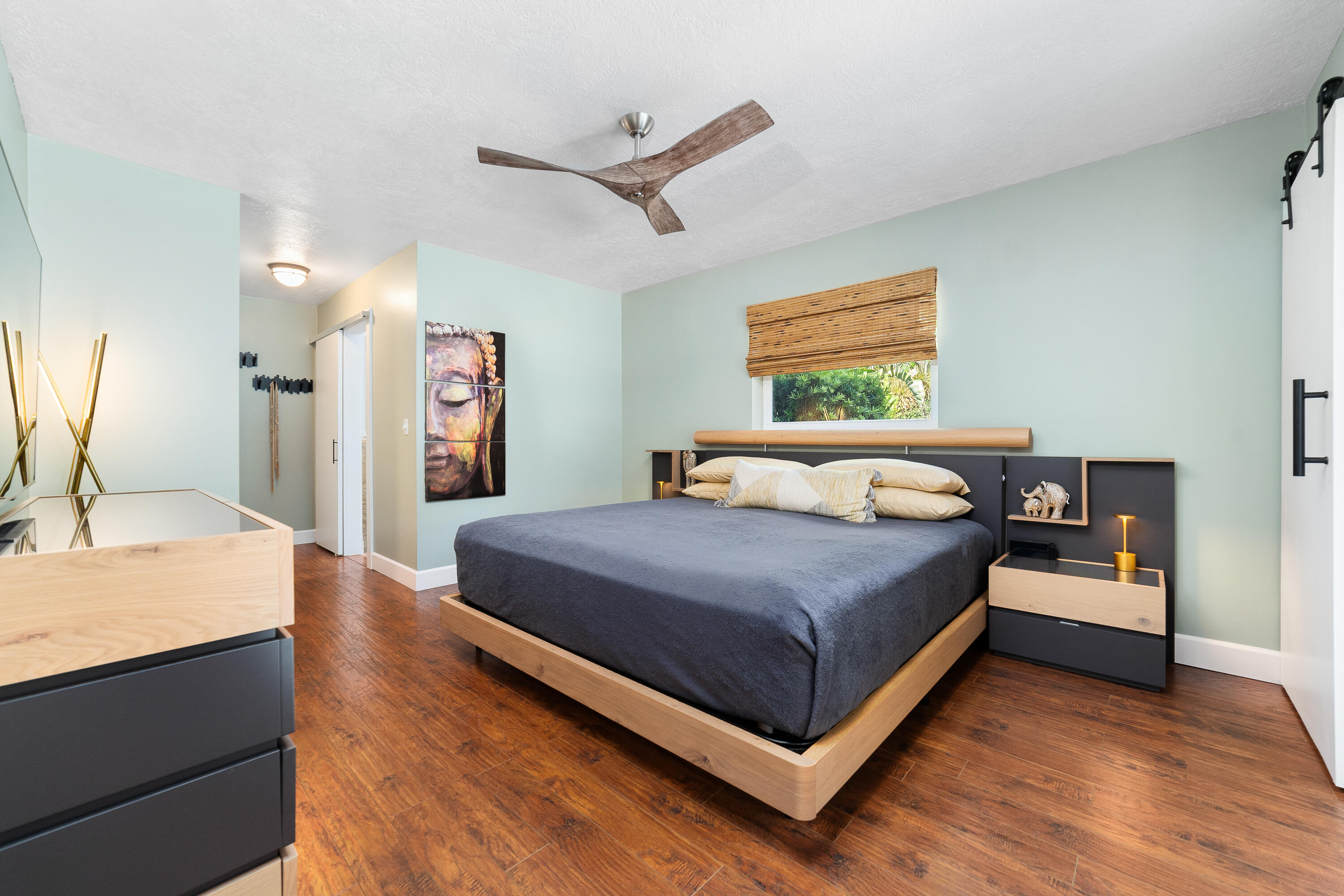 1721 Southwest 9th Street Boca Raton, FL 33486 - Photo 13 of 40 a bedroom with a bed and a dresser