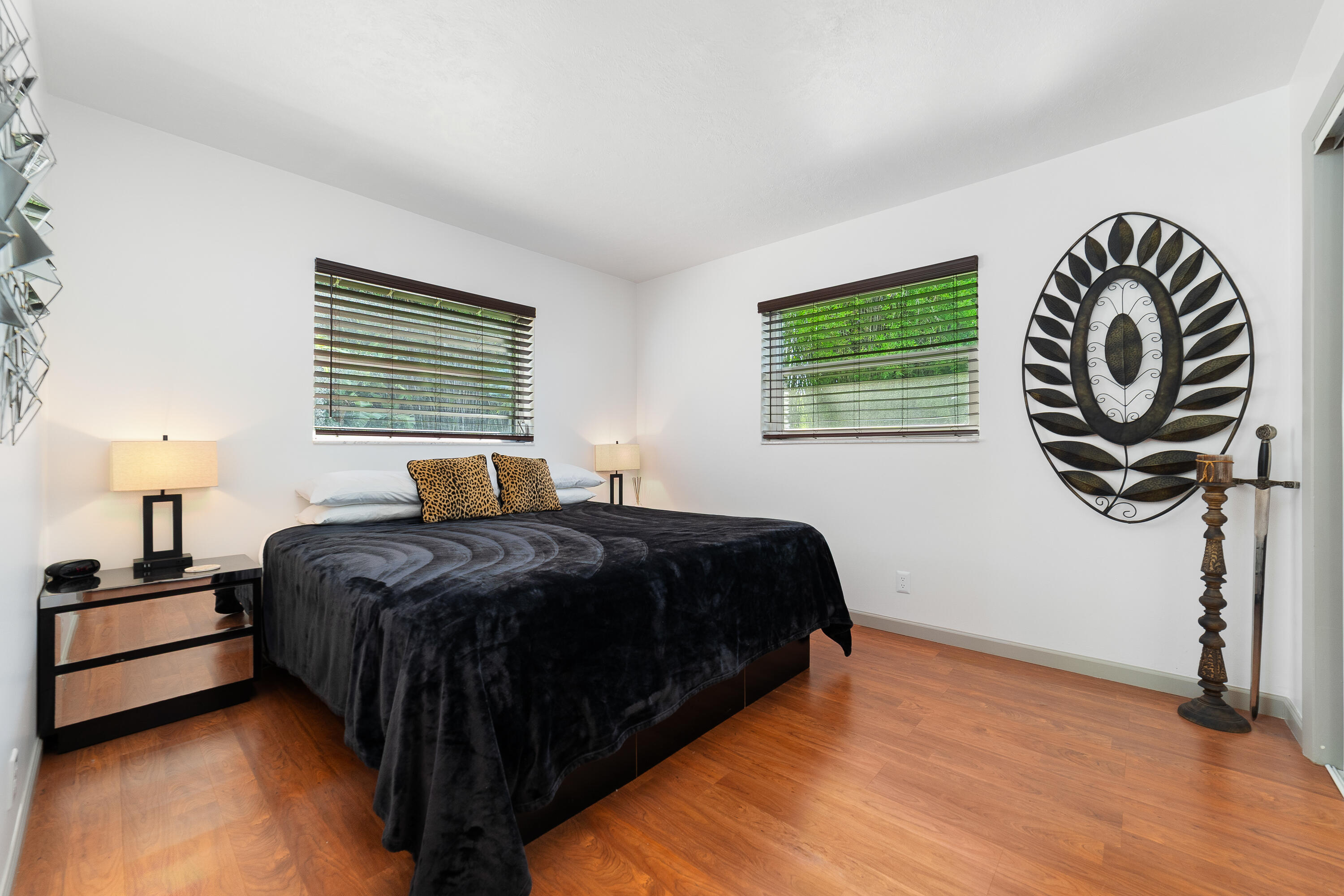 1721 Southwest 9th Street Boca Raton, FL 33486 - Photo 16 of 40 a bedroom with a bed and a window