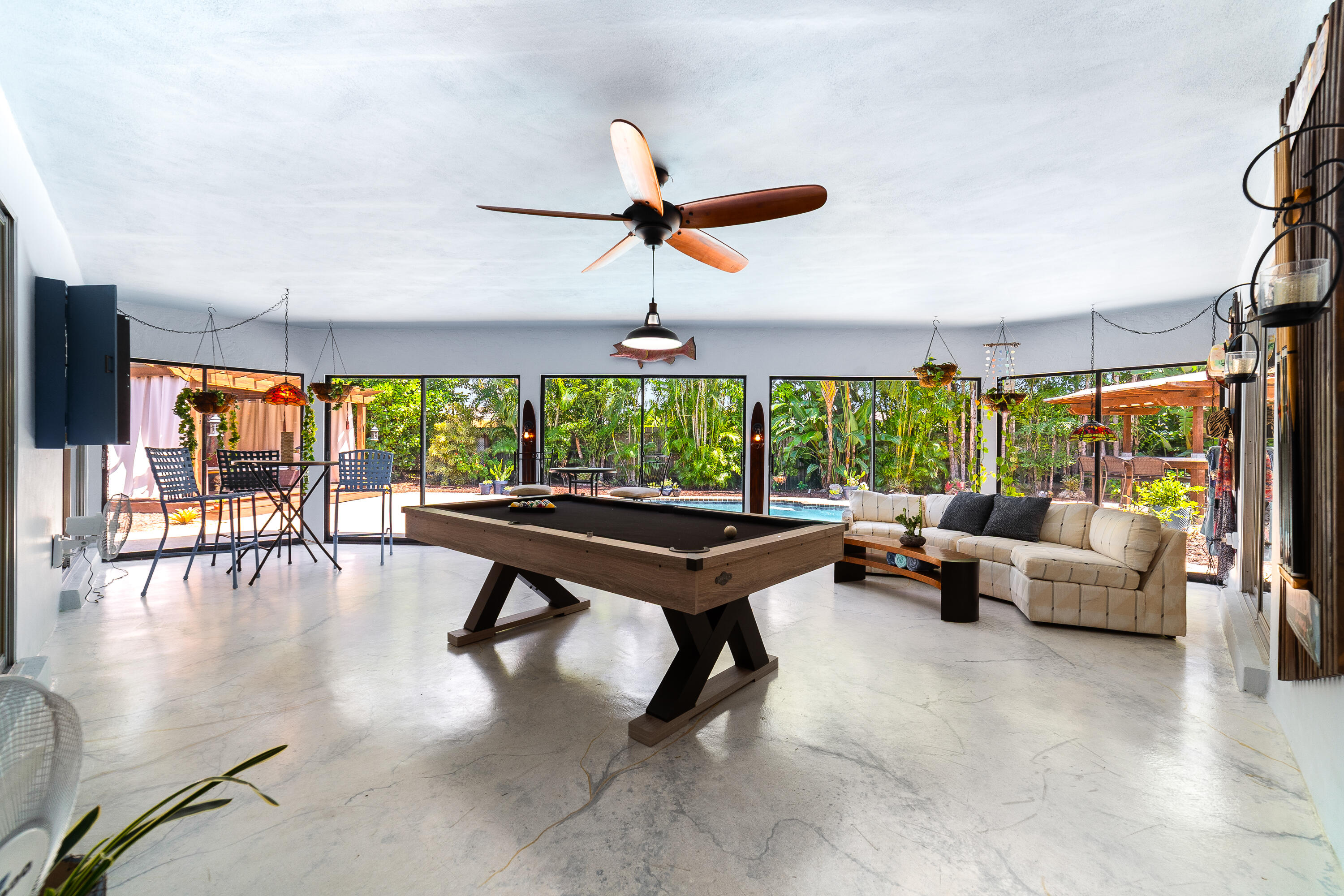 1721 Southwest 9th Street Boca Raton, FL 33486 - Photo 20 of 40 a living room with furniture and a large window