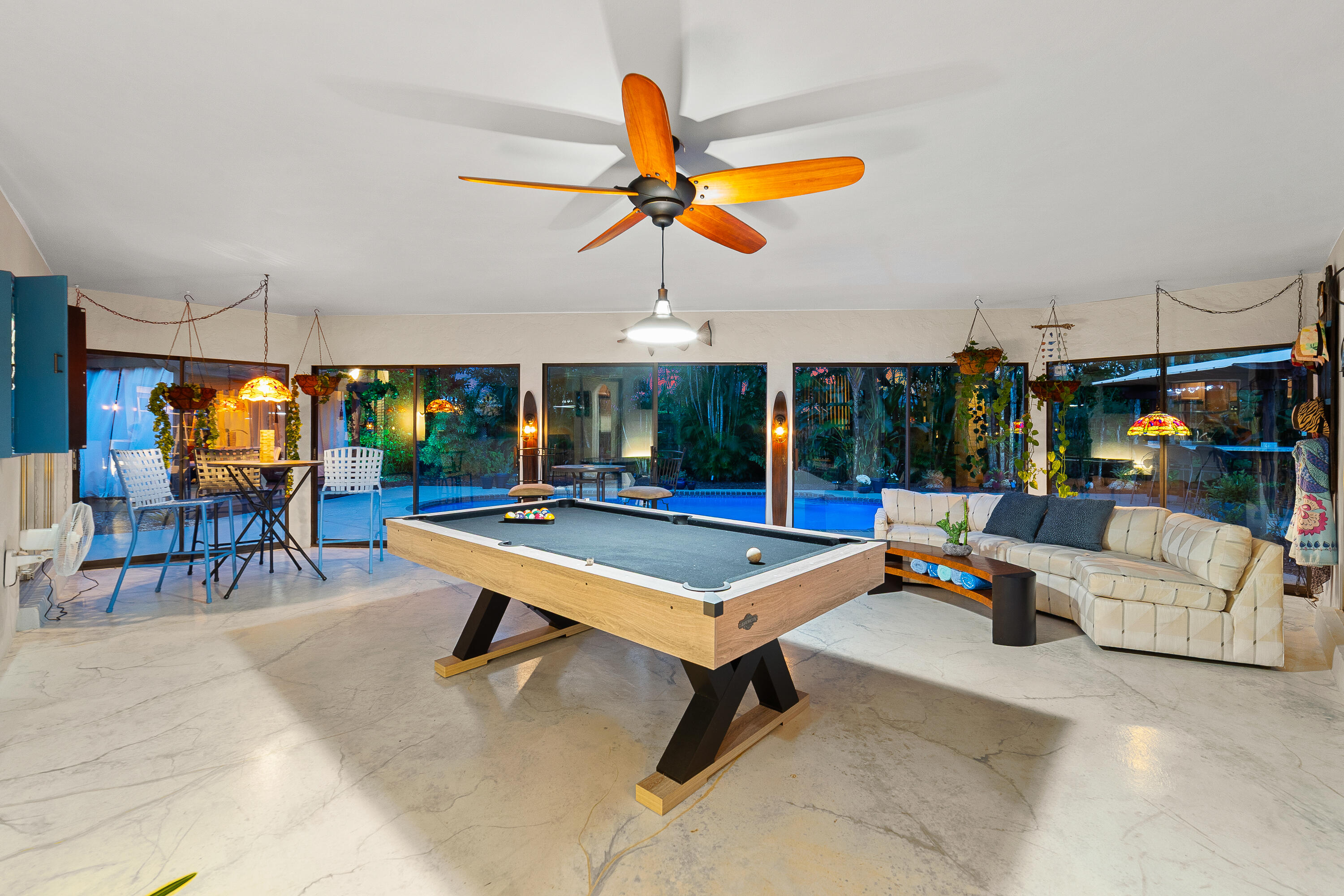 1721 Southwest 9th Street Boca Raton, FL 33486 - Photo 29 of 40 a bedroom with furniture and a chandelier