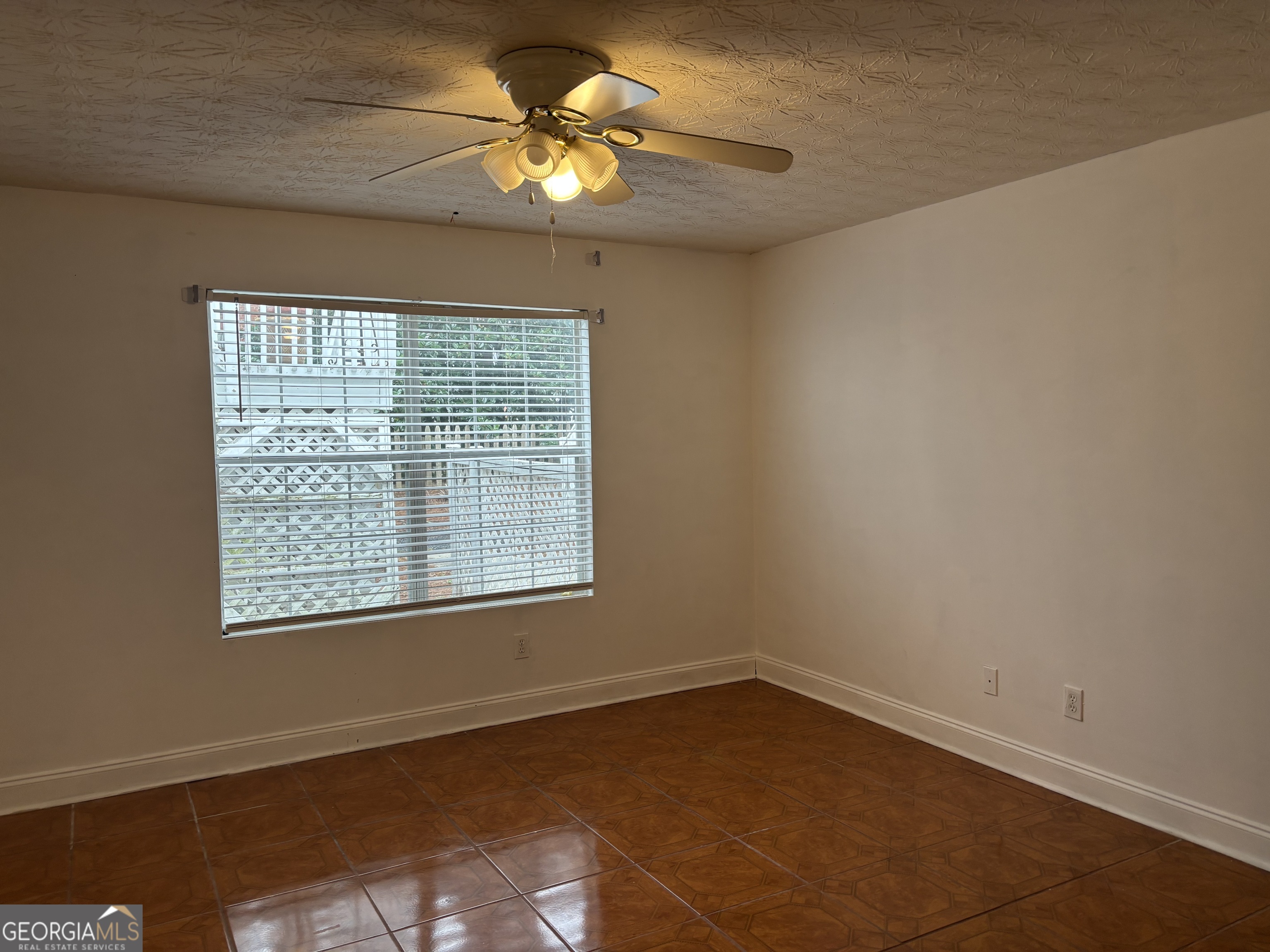 12 Intown Place Fayetteville, GA 30214 - Photo 10 of 12 a view of an empty room with a window