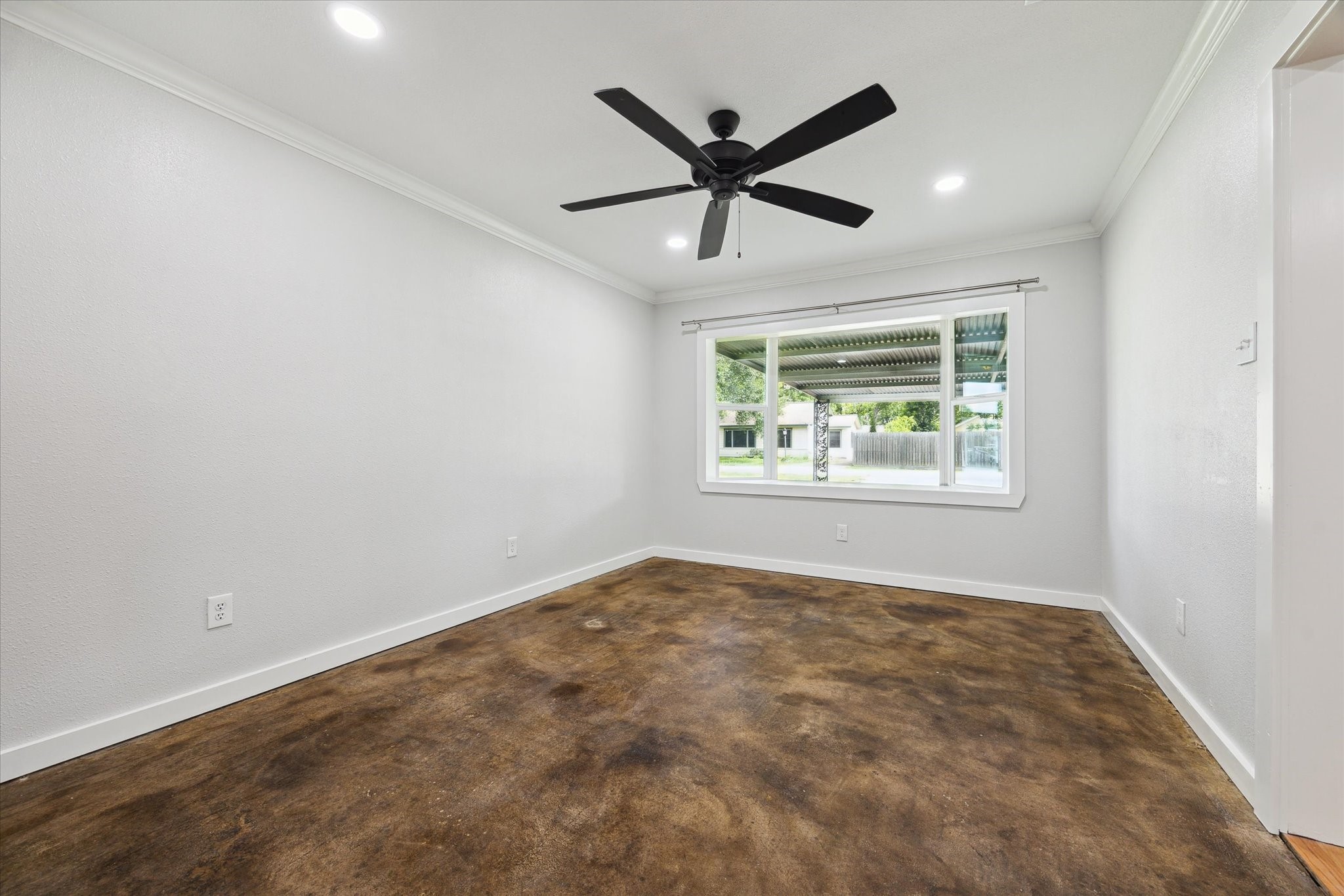 522 Barkley Street Houston, TX 77022 - Photo 14 of 18 Family room, home office, playroom, exercise space....this room can flex to meet your needs. Flooring is freshly stained and sealed concrete. This space is adjacent to the living room.