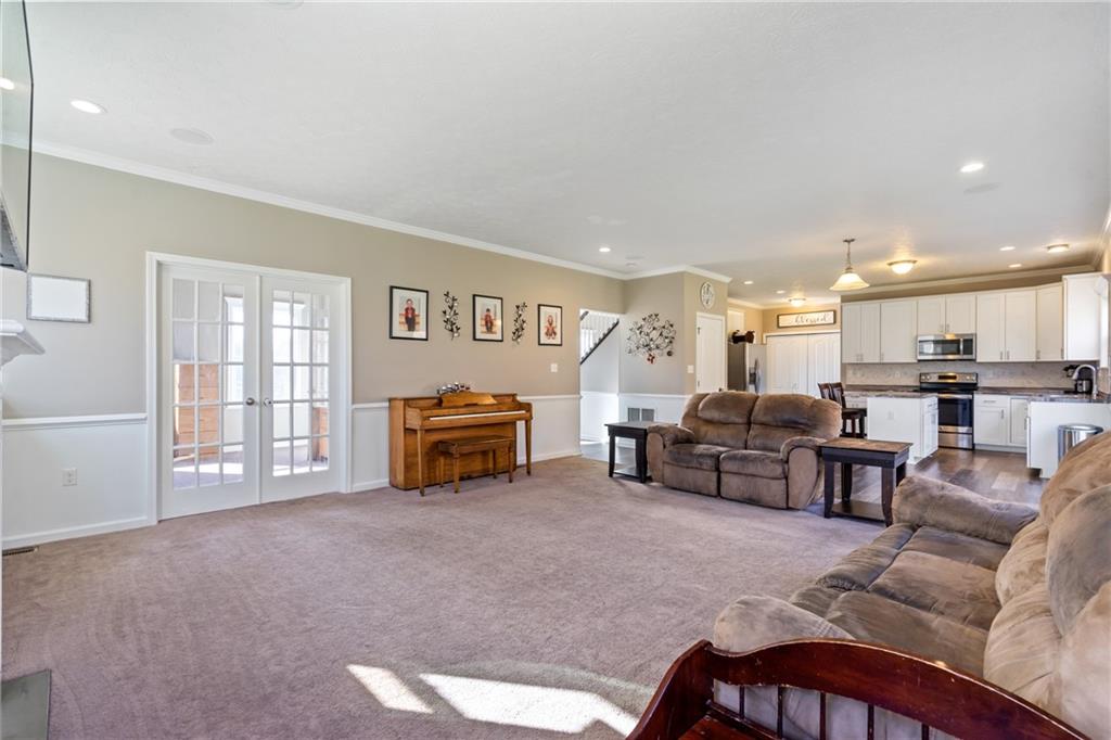 216 West Country Barn Road Houston, PA 15342 - Photo 21 of 34 a living room with furniture and kitchen view