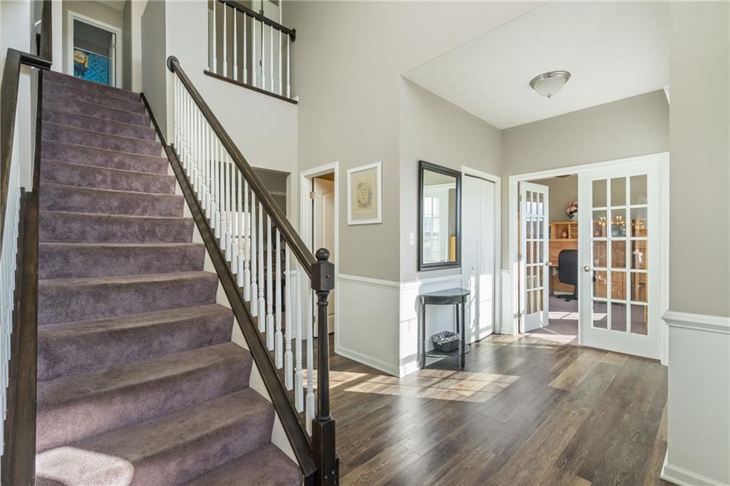 216 West Country Barn Road Houston, PA 15342 - Photo 22 of 34 a view of front door with stairs