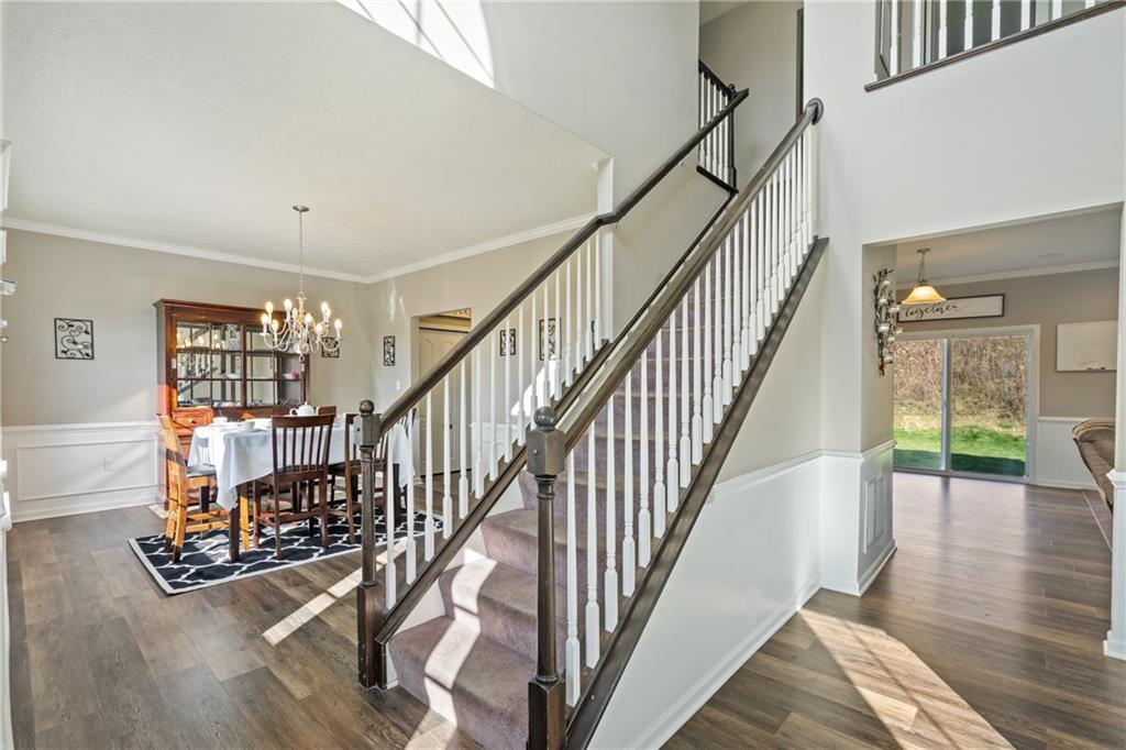 216 West Country Barn Road Houston, PA 15342 - Photo 23 of 34 a view of staircase with wooden floor and a rug