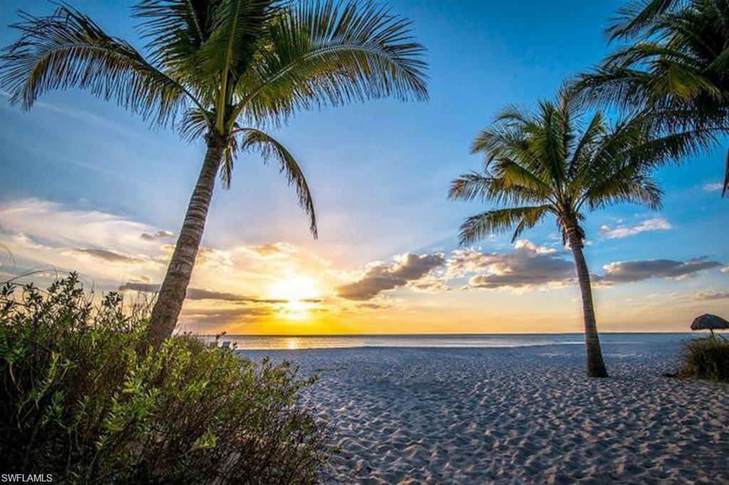 7414 Acorn Way Naples, FL 34119 - Photo 23 of 24 a view of beach and ocean
