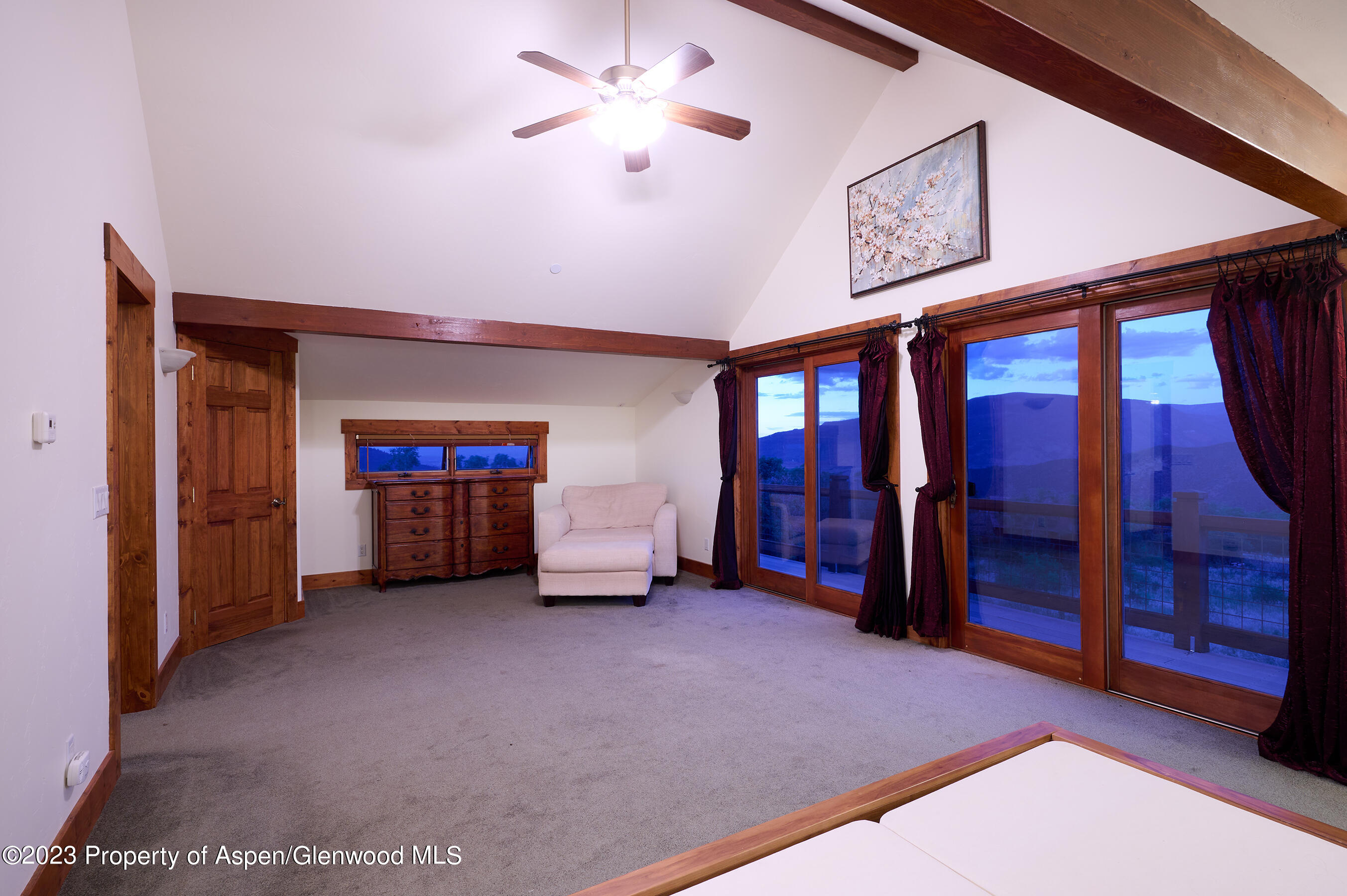 4001 Bear Ridge Road Basalt, CO 81621 - Photo 14 of 35 a view of a livingroom with furniture and a ceiling fan