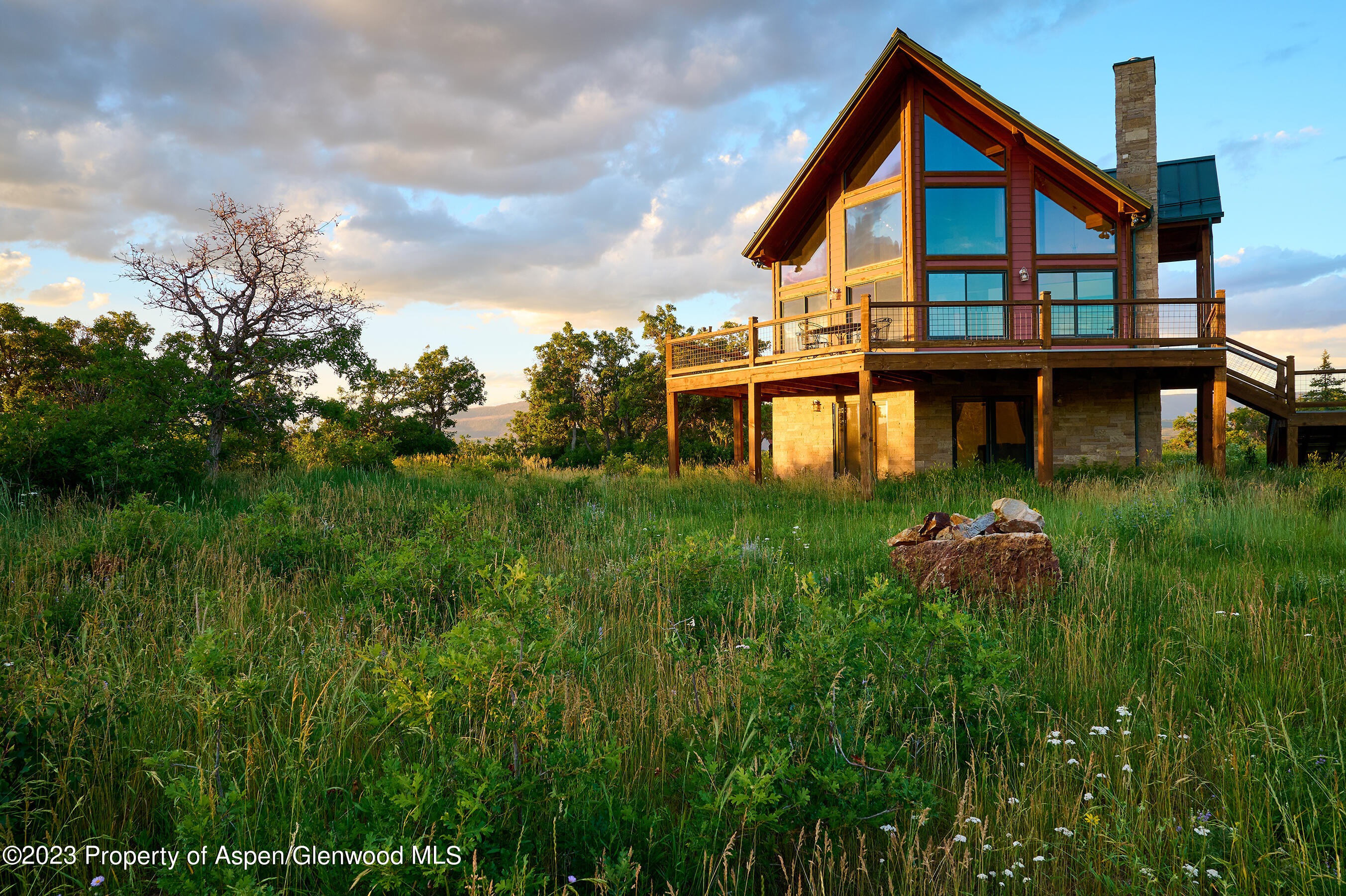 4001 Bear Ridge Road Basalt, CO 81621 - Photo 4 of 35 a backyard of a house with lots of green space