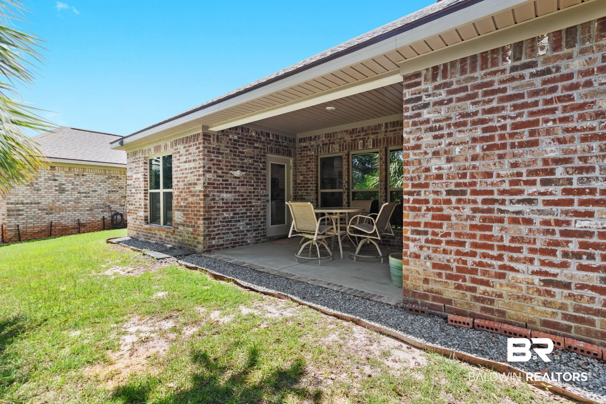 192 Mark Twain Loop Foley, AL 36535 - Photo 34 of 42 View of patio
