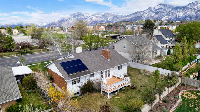1822 East 9800th Street South Sandy, UT 84092 - Photo 14 of 38 Aerial view of residential area with mountains