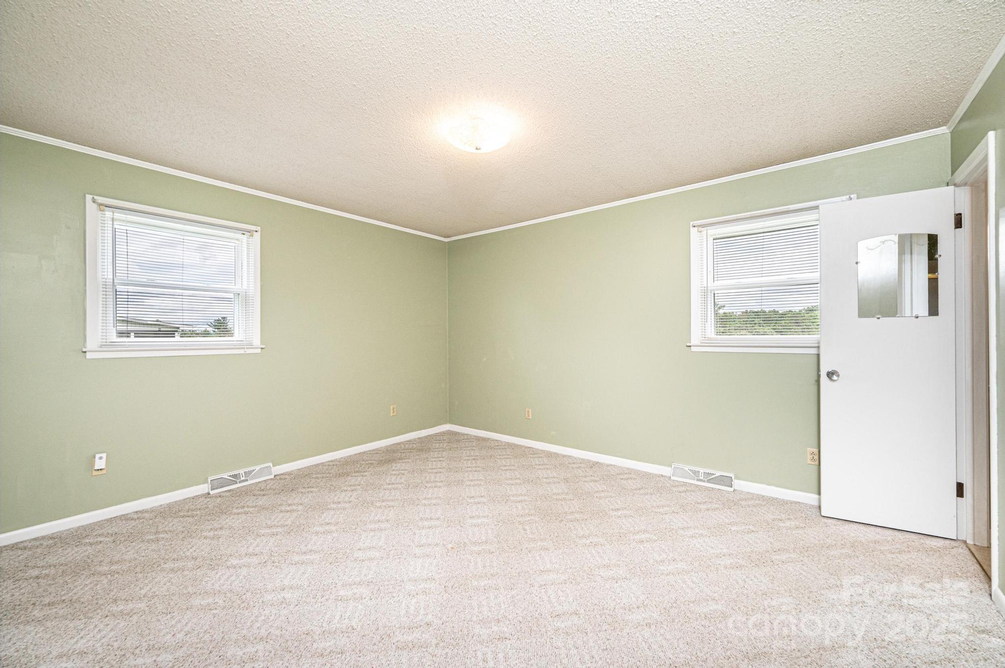 2541 Raintree Street Connelly Springs, NC 28612 - Photo 16 of 46 a view of an empty room with a window