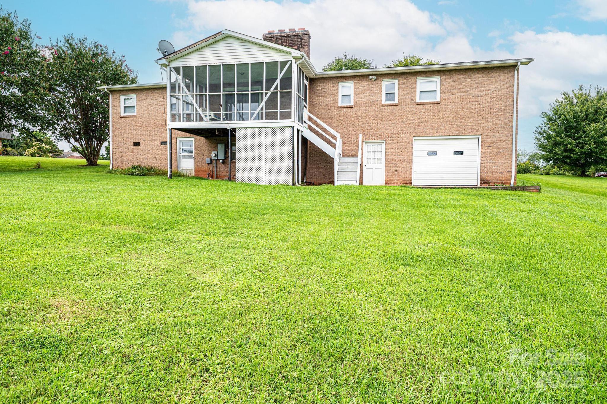2541 Raintree Street Connelly Springs, NC 28612 - Photo 39 of 46 front view of a house with a big yard