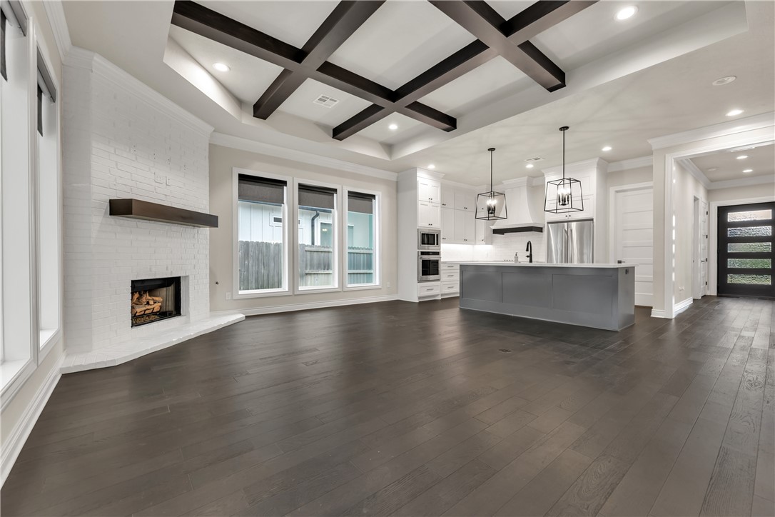 1736 Blanco Bend Drive College Station, TX 77845 - Photo 11 of 36 an empty room with wooden floor and windows