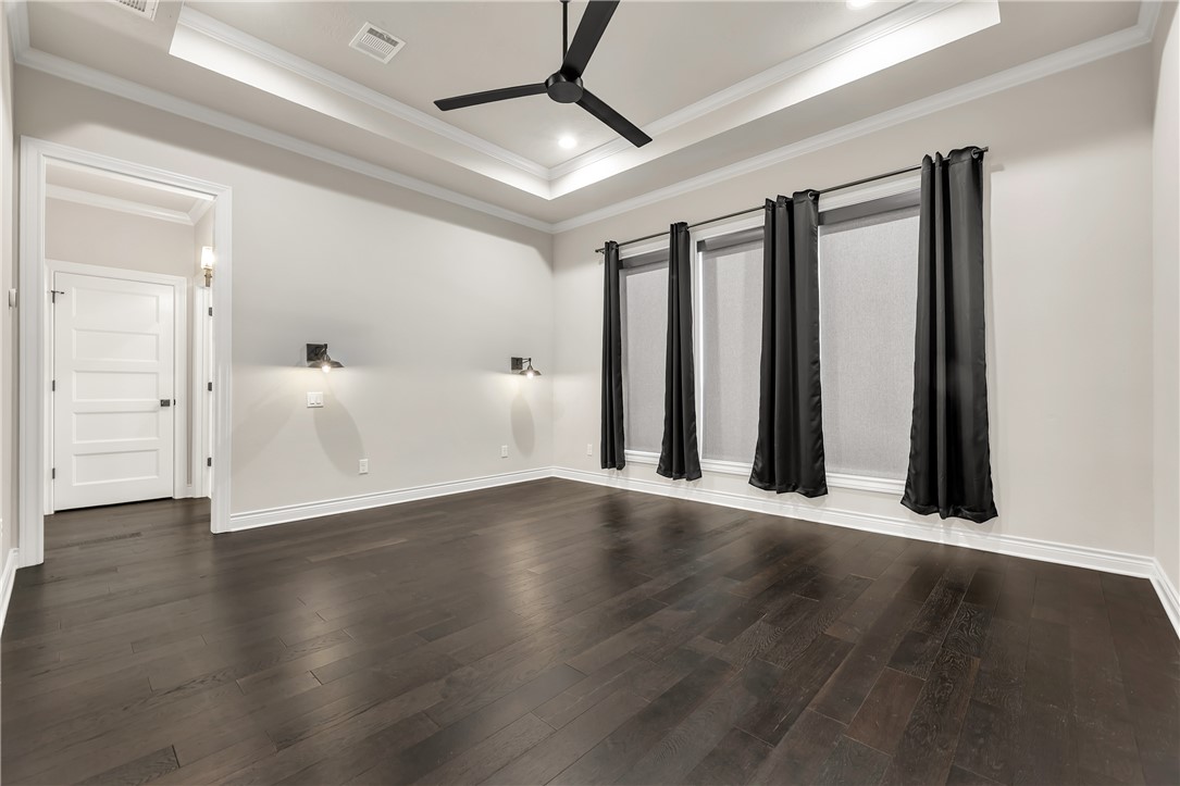 1736 Blanco Bend Drive College Station, TX 77845 - Photo 19 of 36 an empty room with wooden floor and windows